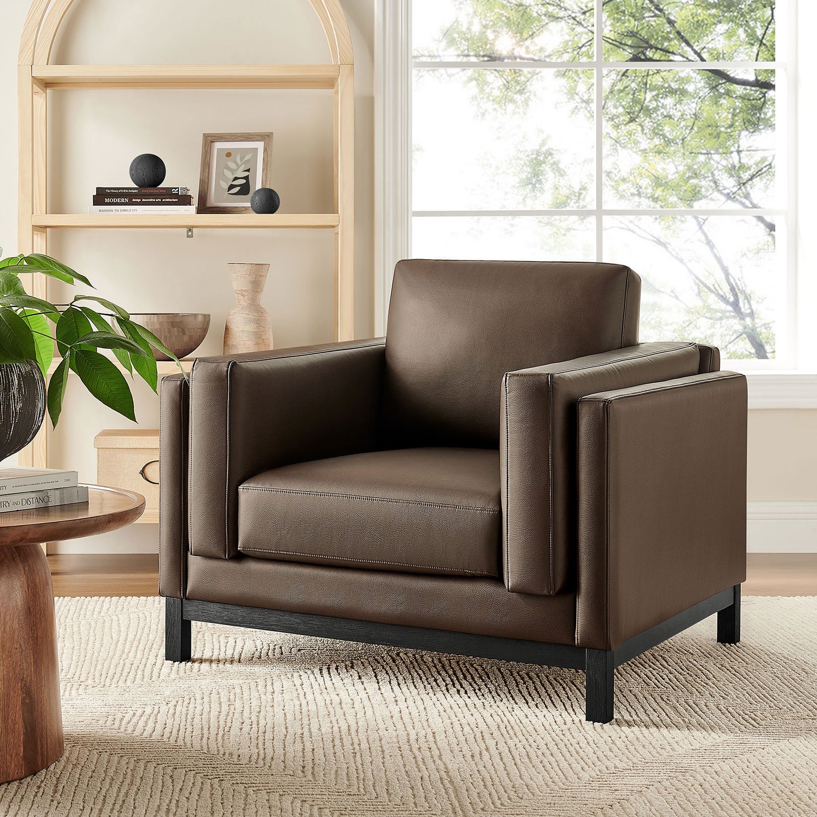Elevates living spaces with espresso vegan leather, tailored cushions, and a clean-lined modern form || EEI-7337-ESP || front_angle_room