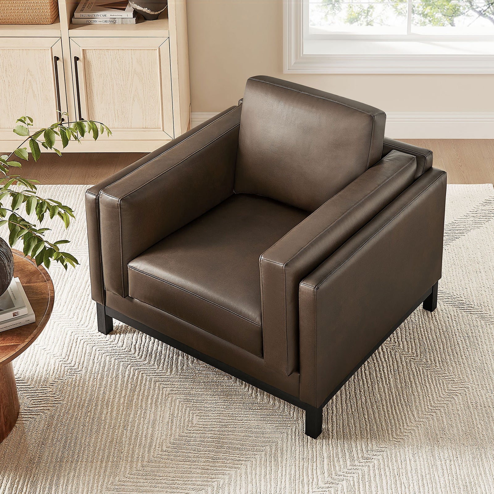 Comfortable lounge chair pairs plush cushioning with crisp edges and a dark wood base || EEI-7337-ESP || top_angle_room