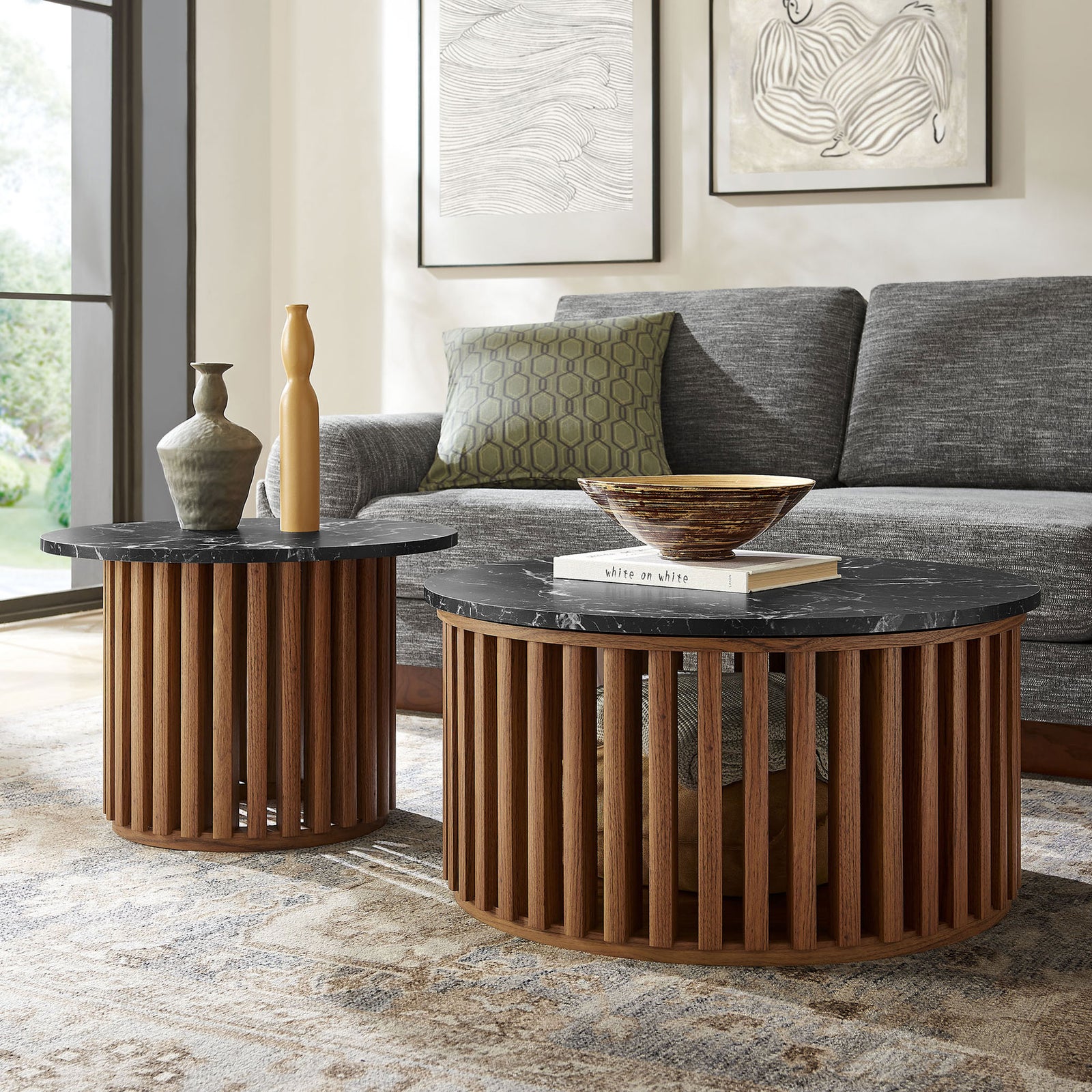 Sculptural slatted bases and bold marble tops anchor the room with contemporary style. || EEI-7345-WAL-BLK || front_angle_room