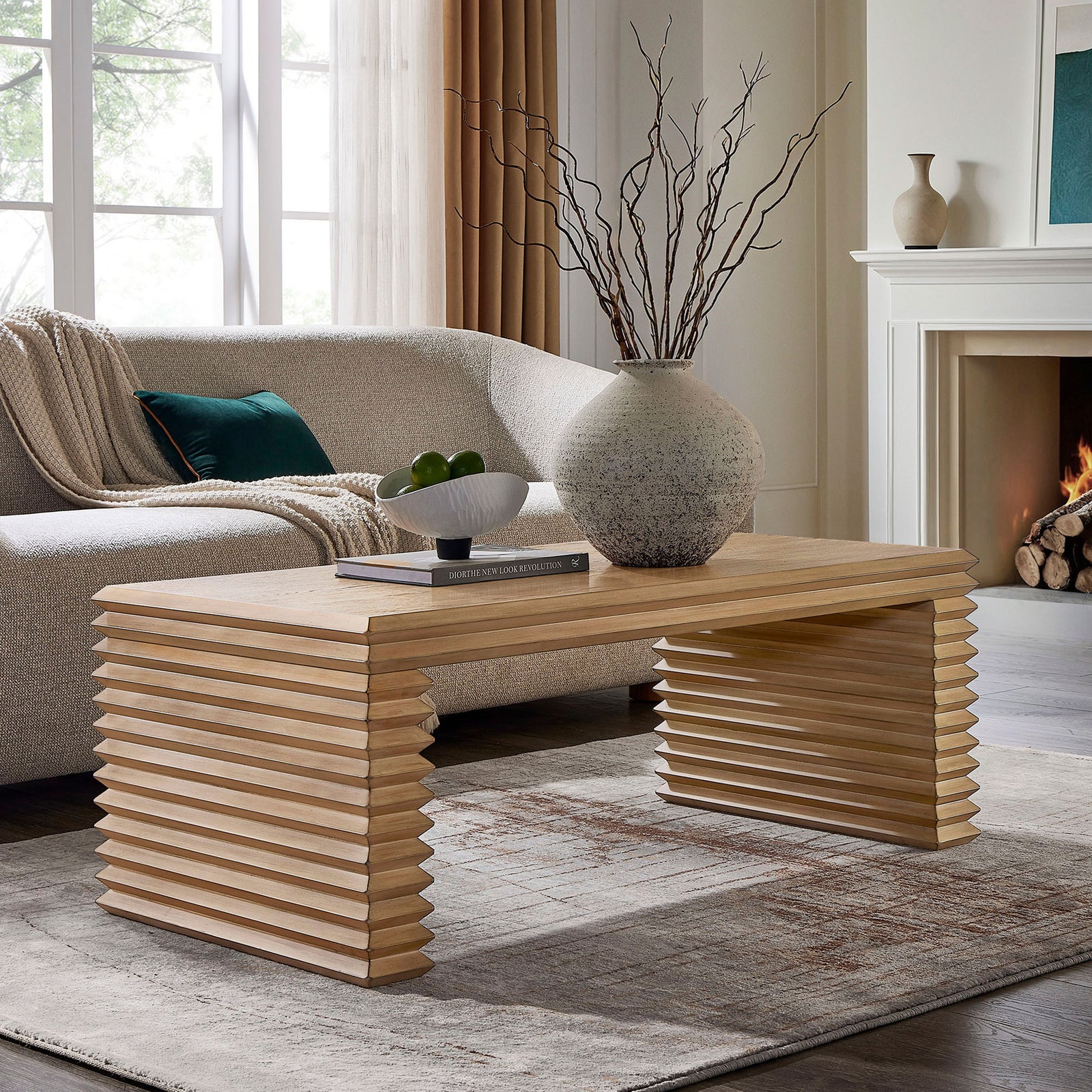 Modern centerpiece blends clean lines with dimensional stacked legs for a bold living room statement || EEI-7348-WOA || front_angle_room
