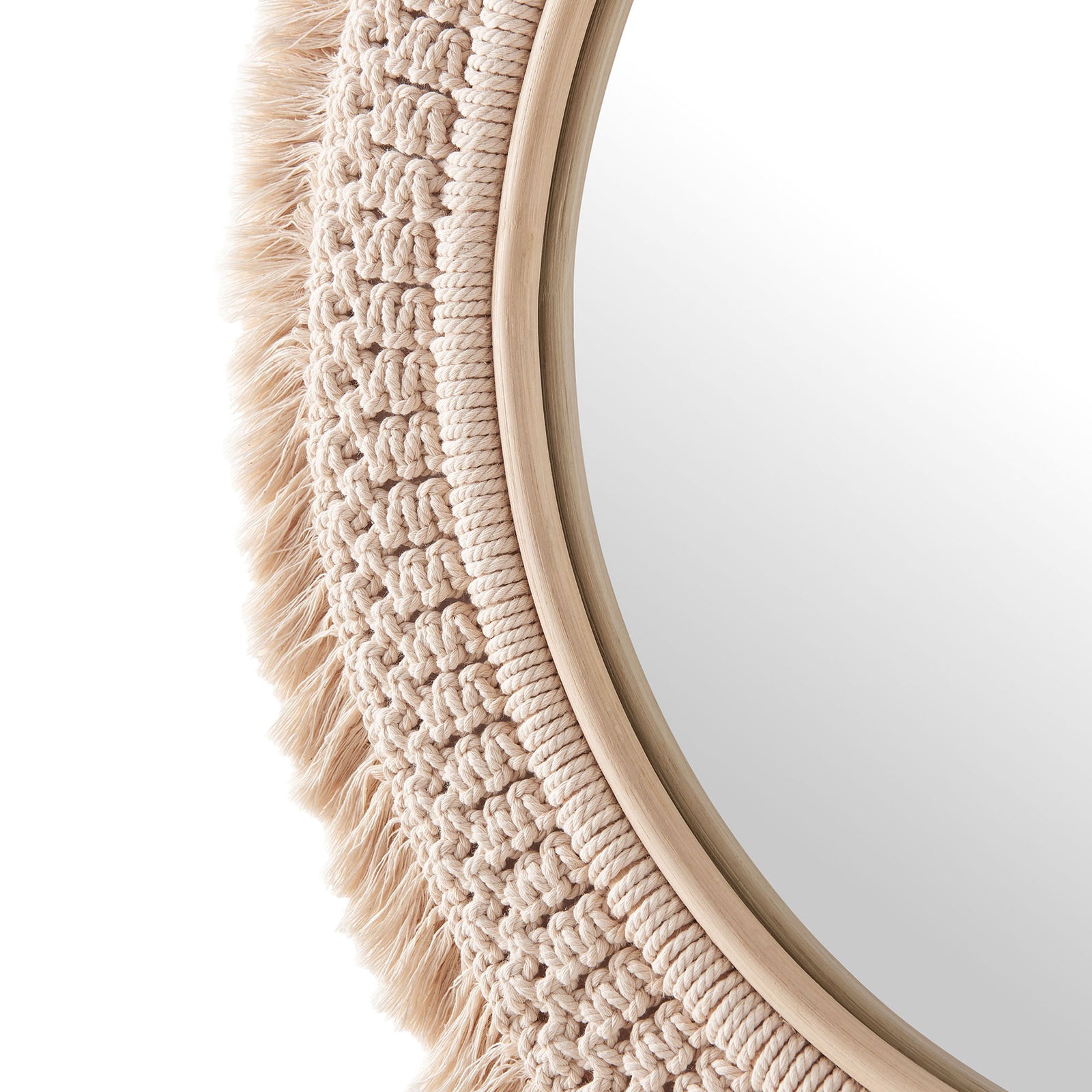 Handwoven macrame pattern and natural rattan frame highlighting the mirror's soft texture and fringe. || EEI-7367-NAT || swatch_studio