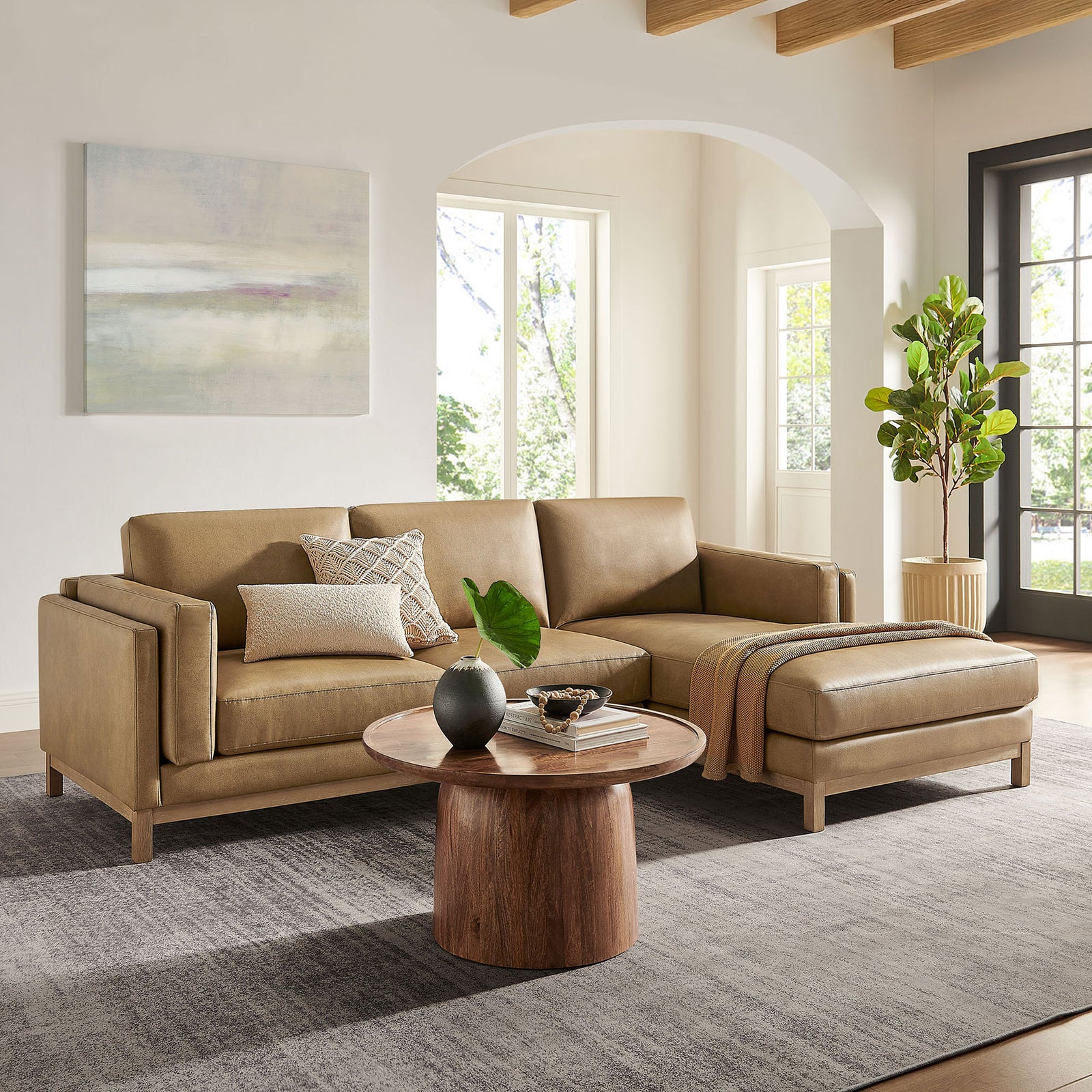 Right-facing Roscoe sectional styled with wood coffee table in bright living space || EEI-7377-TST || front_angle_room
