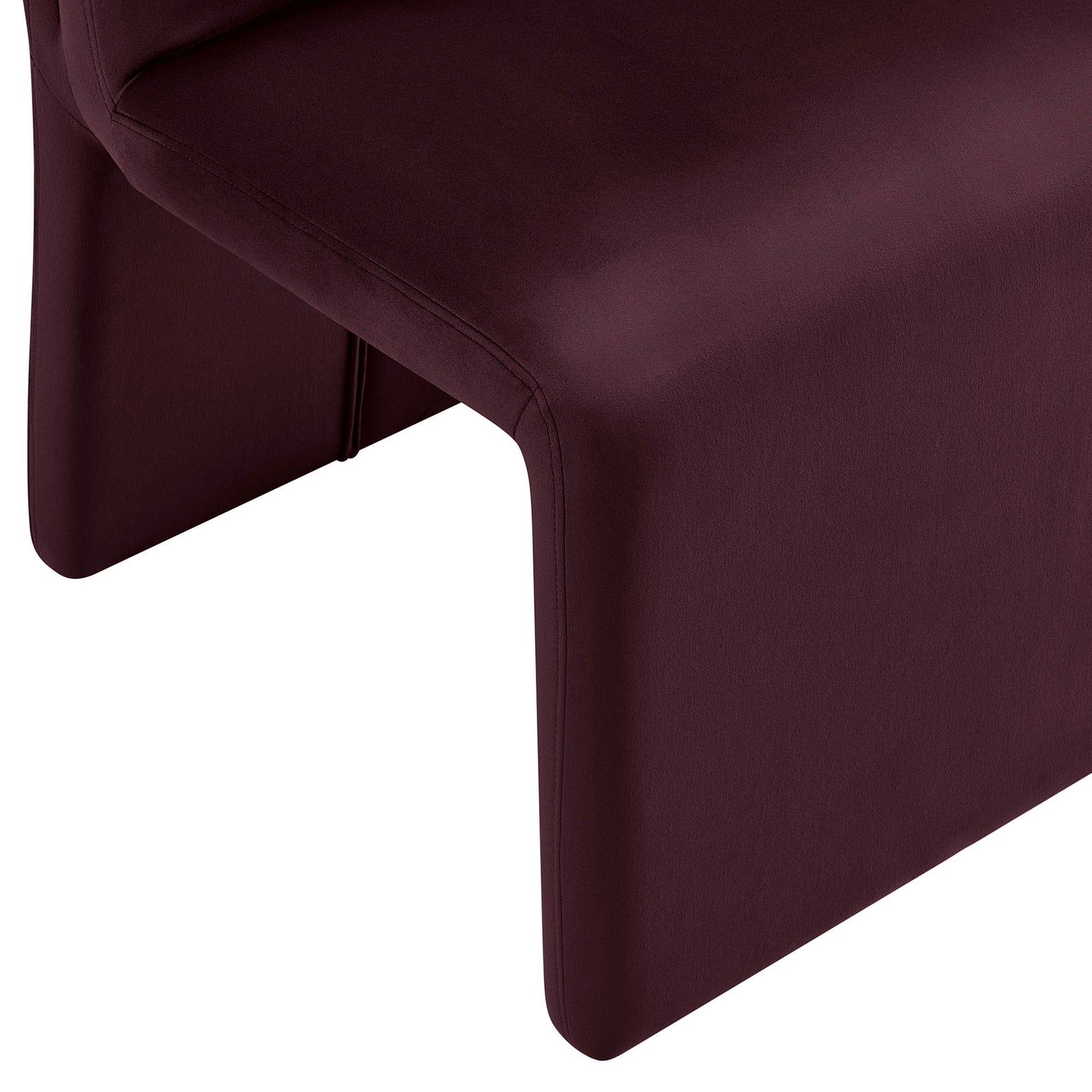 Soft velvet upholstery drapes smoothly over the chair base, creating a tailored waterfall edge detail || EEI-7384-MUL || detail_studio