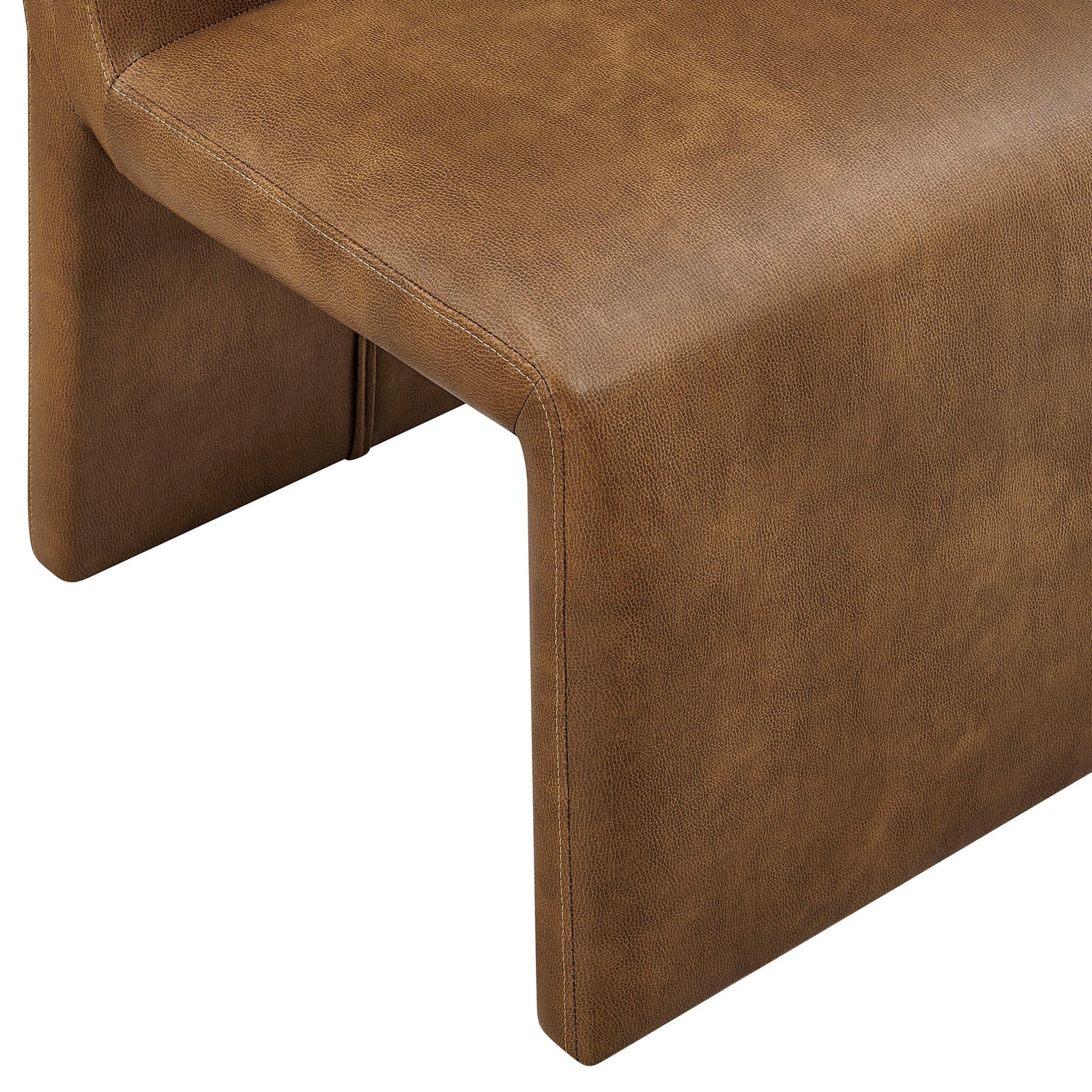 Waterfall front edge and tonal stitching add tailored detail to the padded canyon vegan leather dining chair || EEI-7385-CYN || detail_studio