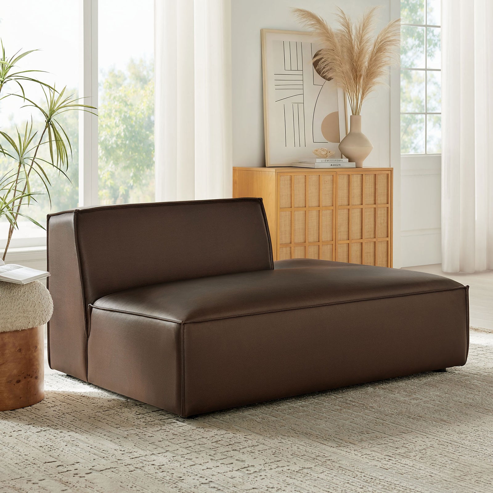 Modern right-facing chaise anchors the room with plush support and easy-care vegan leather. || EEI-7389-ESP || front_angle_room