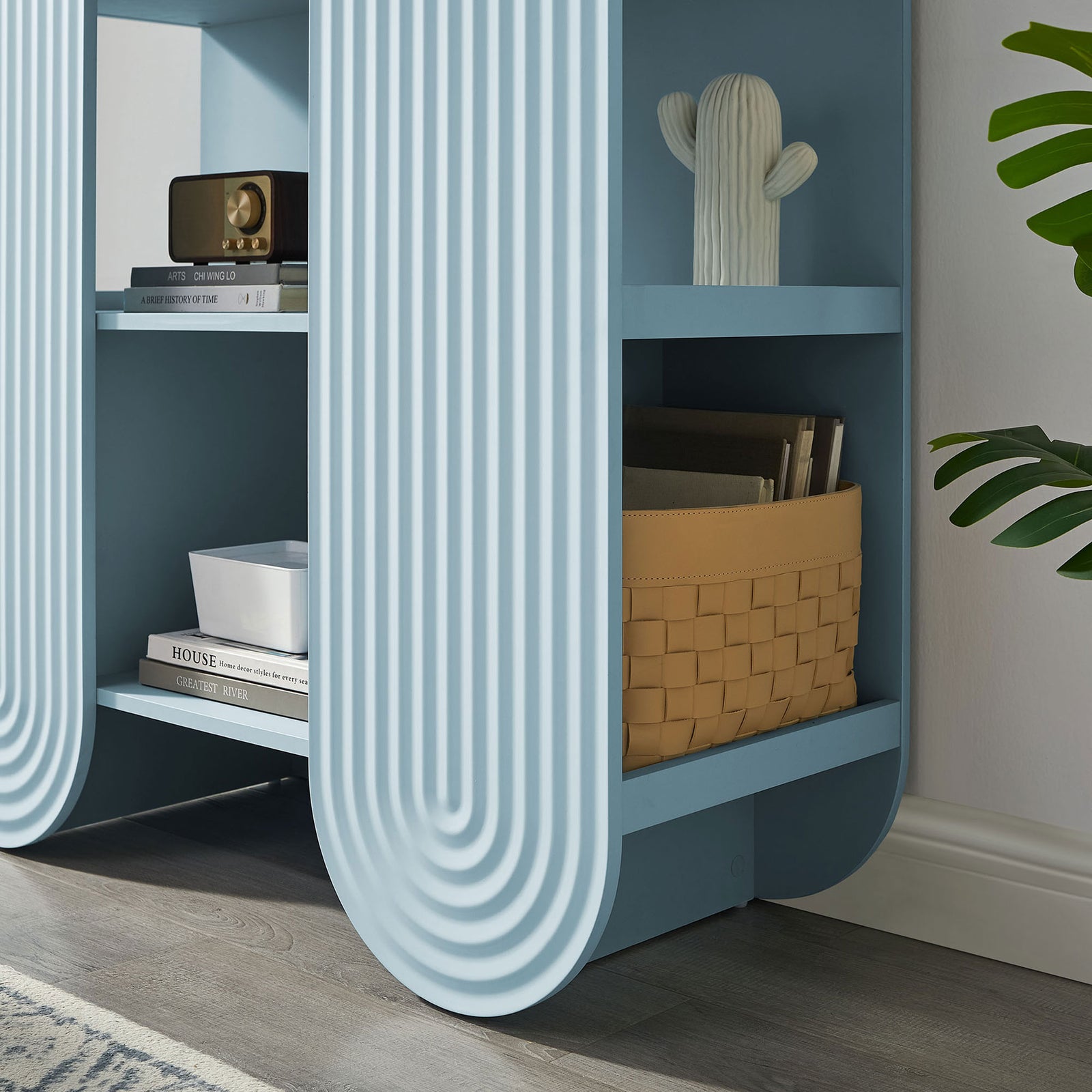 Lower shelves keep baskets, books, and accents tidy while ripple arch adds character || EEI-7390-LBL || detail_room