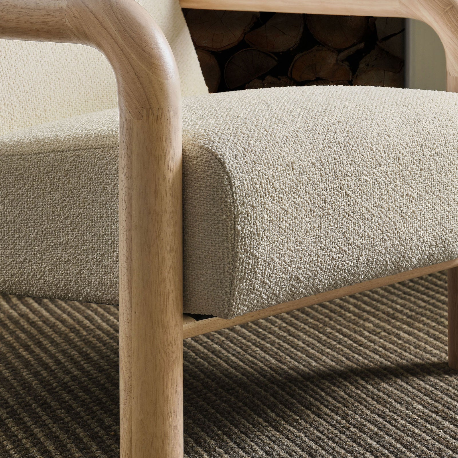 Boucle texture and light wood arm detail add warmth and tactility to contemporary spaces || EEI-7391-CRE-OAK || detail_room