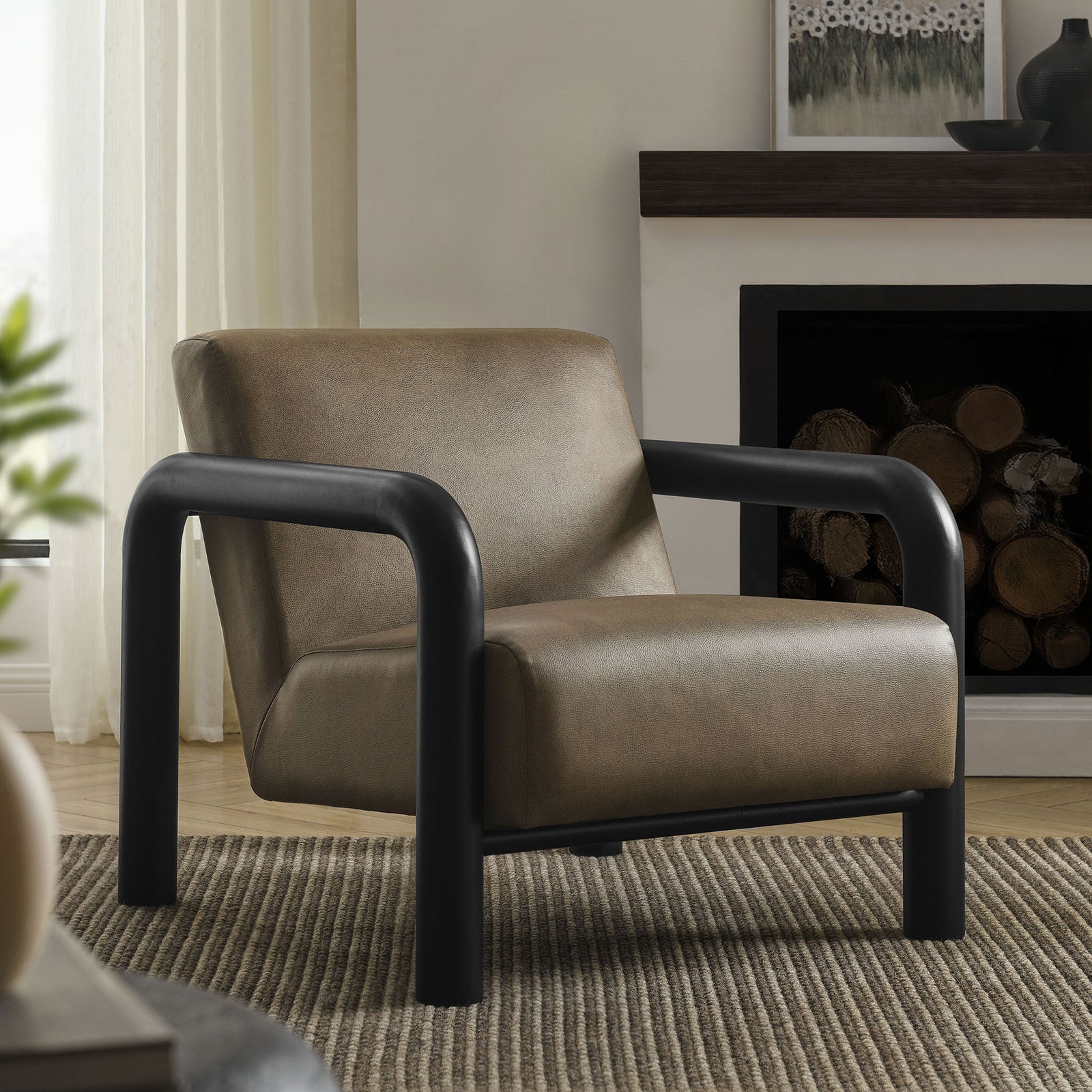 Warm mushroom-black tones and sculptural arms anchor the room with effortless modern style. || EEI-7392-MUS-BLK || front_angle_room