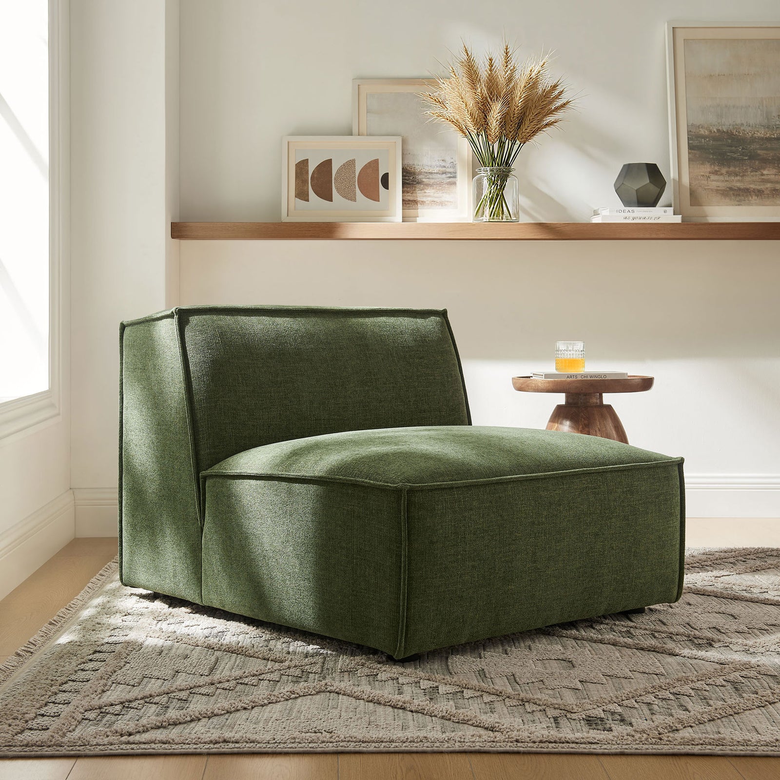 Foliage green modular chair adds plush, modern comfort to the living room with a low, inviting silhouette || EEI-7395-FOL || front_angle_room