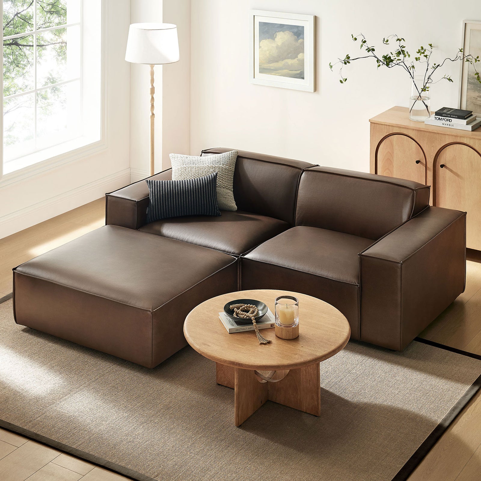 Espresso vegan leather modular loveseat with ottoman anchors a warm, modern living room with inviting lounge comfort. || EEI-7406-ESP || front_angle_room