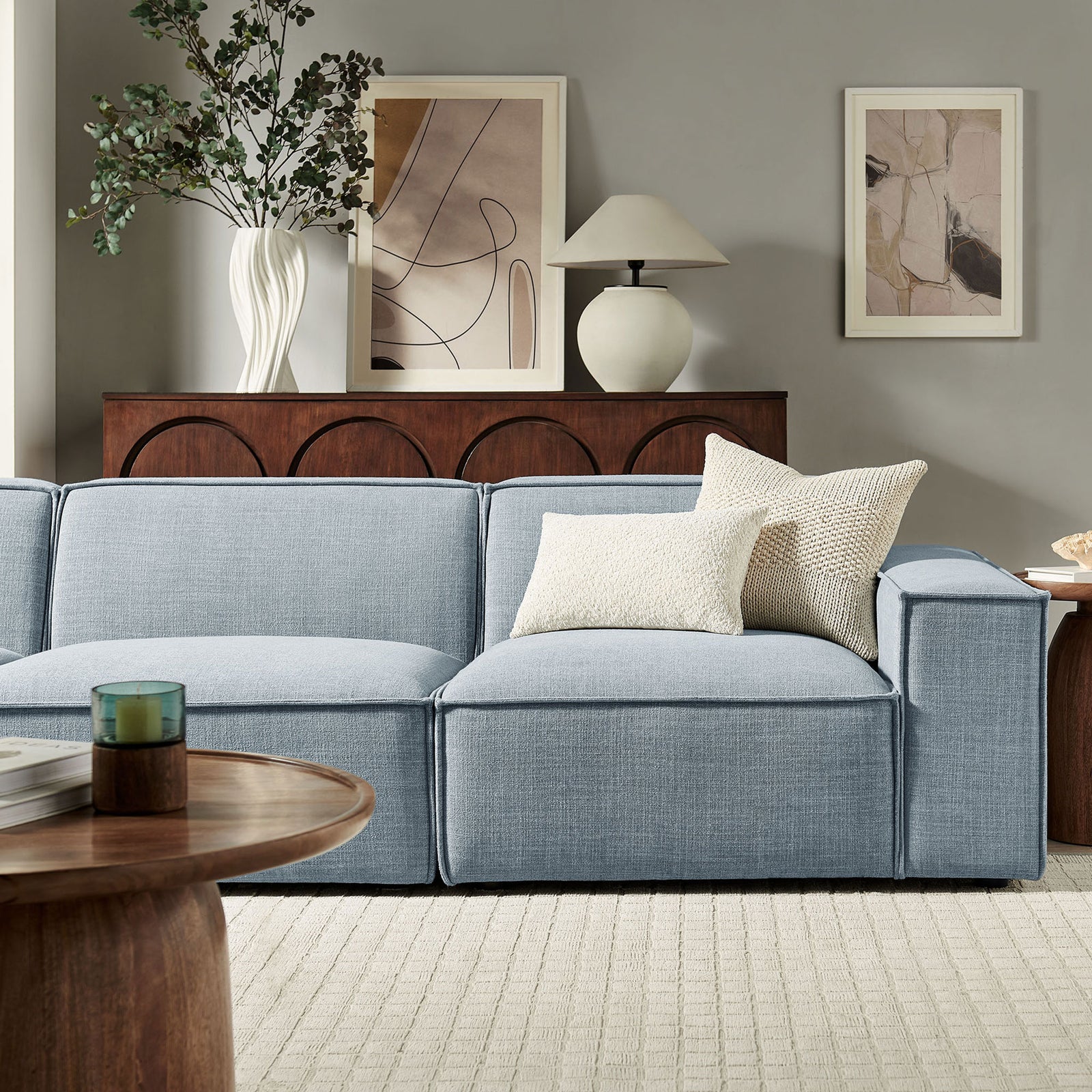 Sky blue modular sofa paired with neutral decor for a relaxed, modern living room look || EEI-7407-SKY || detail_room