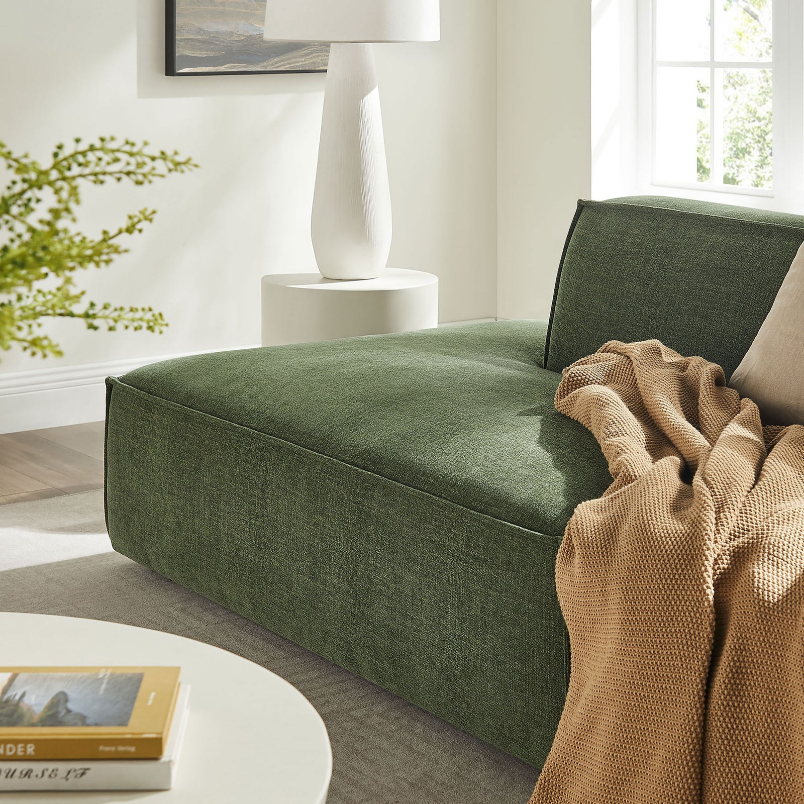 Soft foliage green upholstery with French piping and a plush chaise-style seat for cozy lounging. || EEI-7423-FOL || detail_room