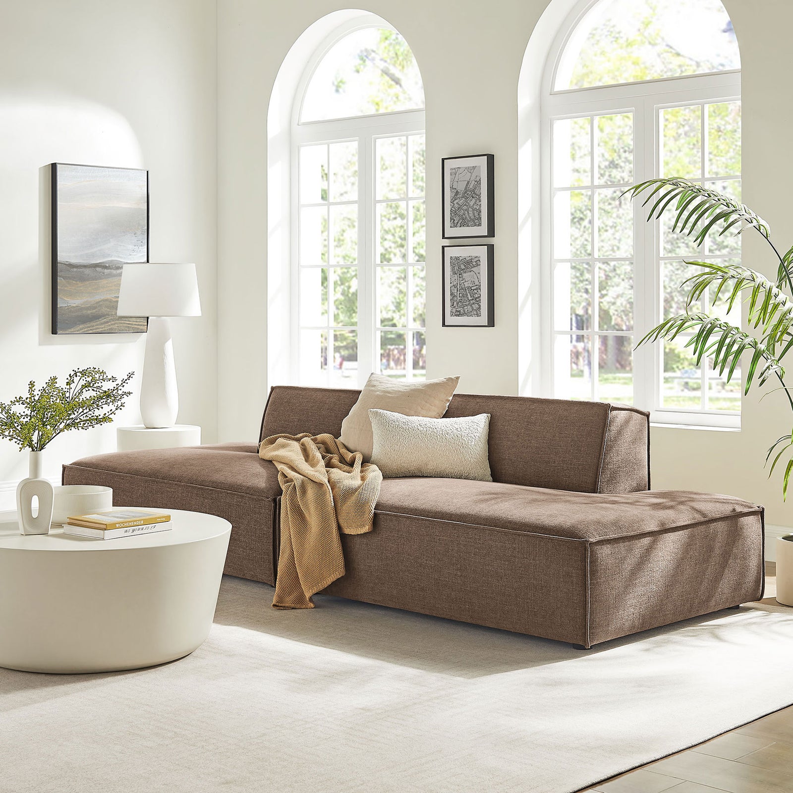 Mocha performance fabric modular loveseat creating a relaxed lounge centerpiece in a sunlit living room || EEI-7423-MOC || front_angle_room