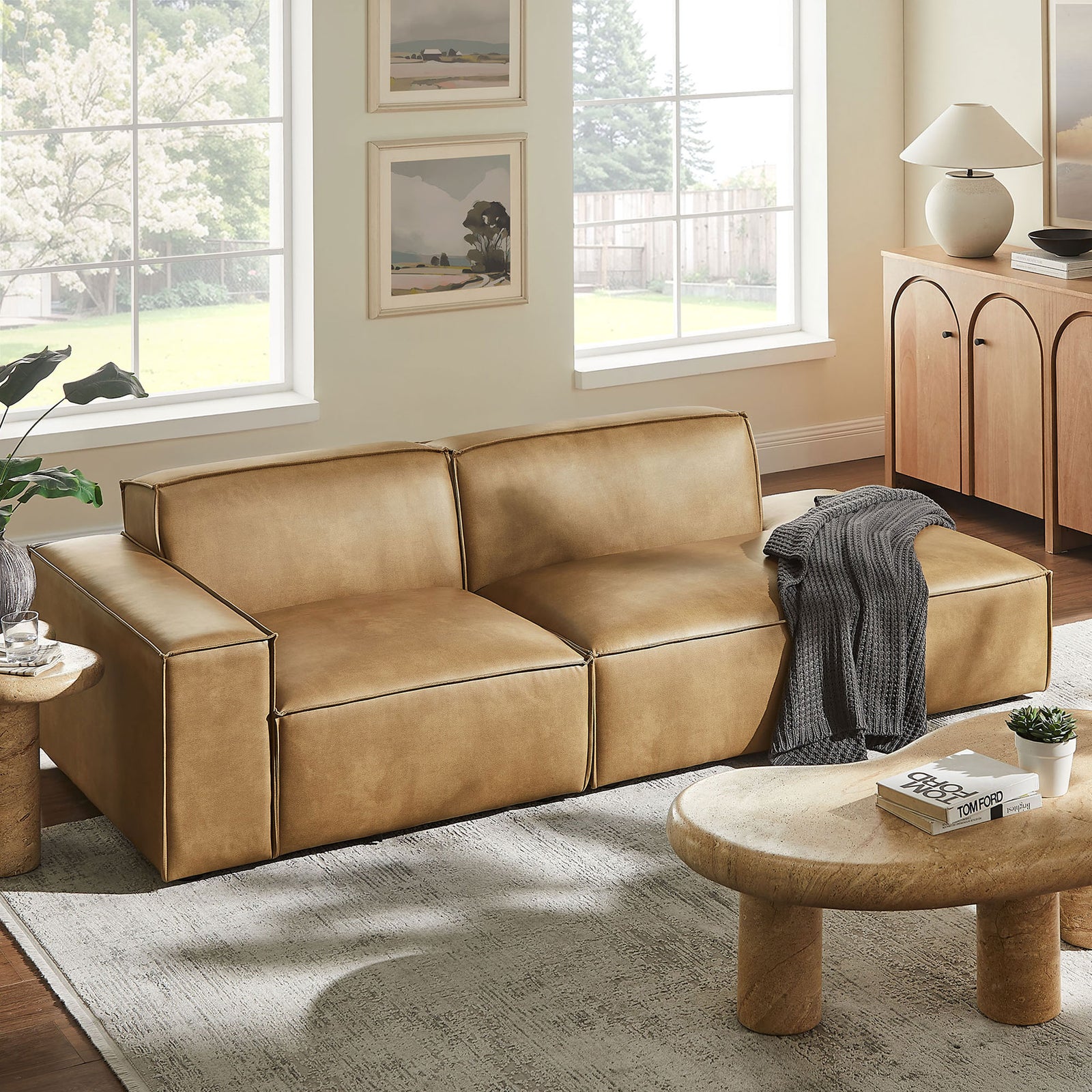 Modular loveseat styled in a bright living room, pairing a wide block arm with inviting lounge seating. || EEI-7426-TST || front_angle_room