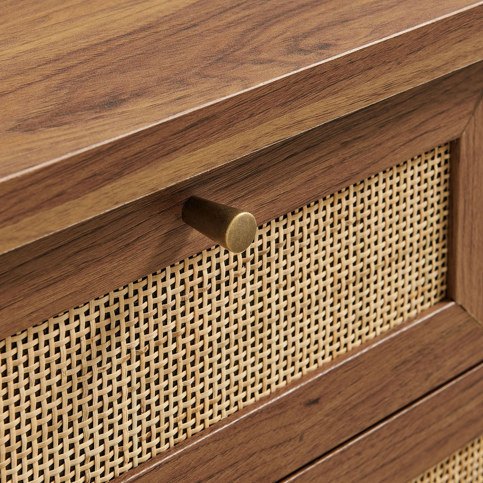 Brushed brass knob and cane-style rattan weave framed by rich walnut wood grain || EEI-7435-WAL || handle_studio