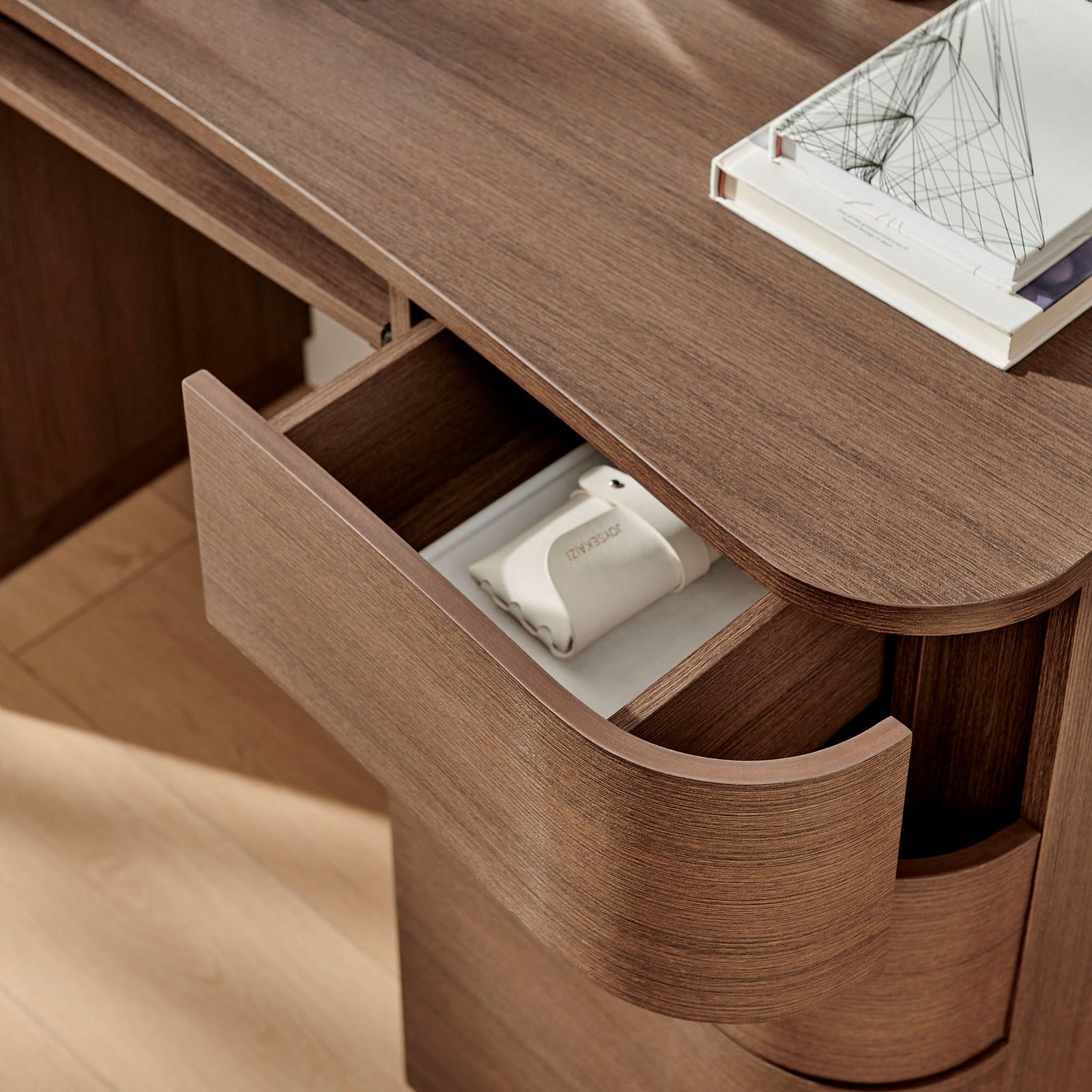 Rounded drawer reveals roomy interior for neatly storing accessories and office essentials. || EEI-7436-BBO || storage_open_room