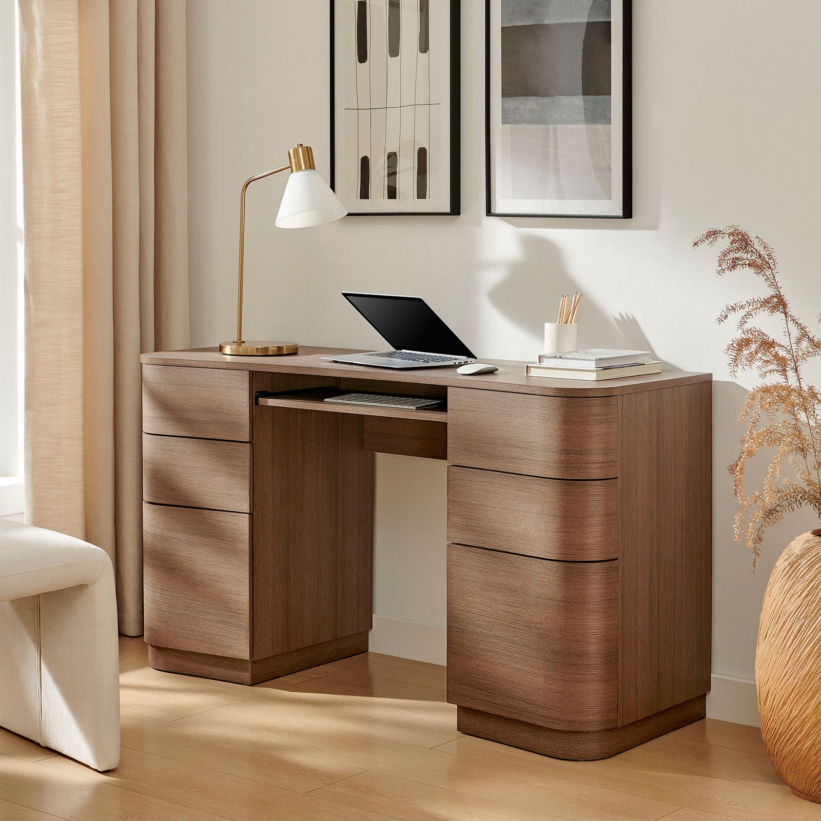 Modern home office look with curved six-drawer desk in warm brushed brown oak finish. || EEI-7436-BBO || front_angle_room