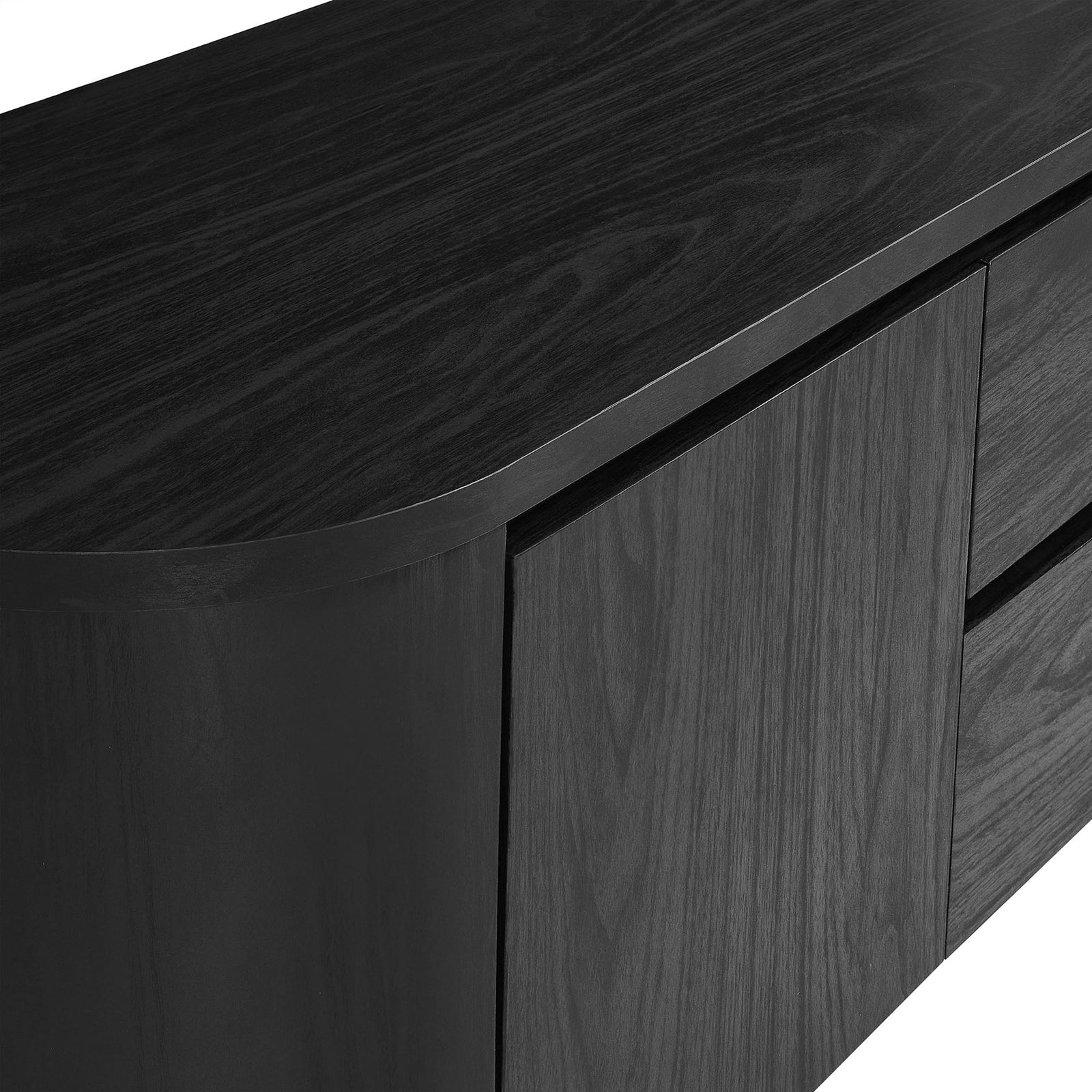 Close view of the black wood grain top and softly rounded edges of the Duval TV cabinet || EEI-7440-BLK || detail_studio