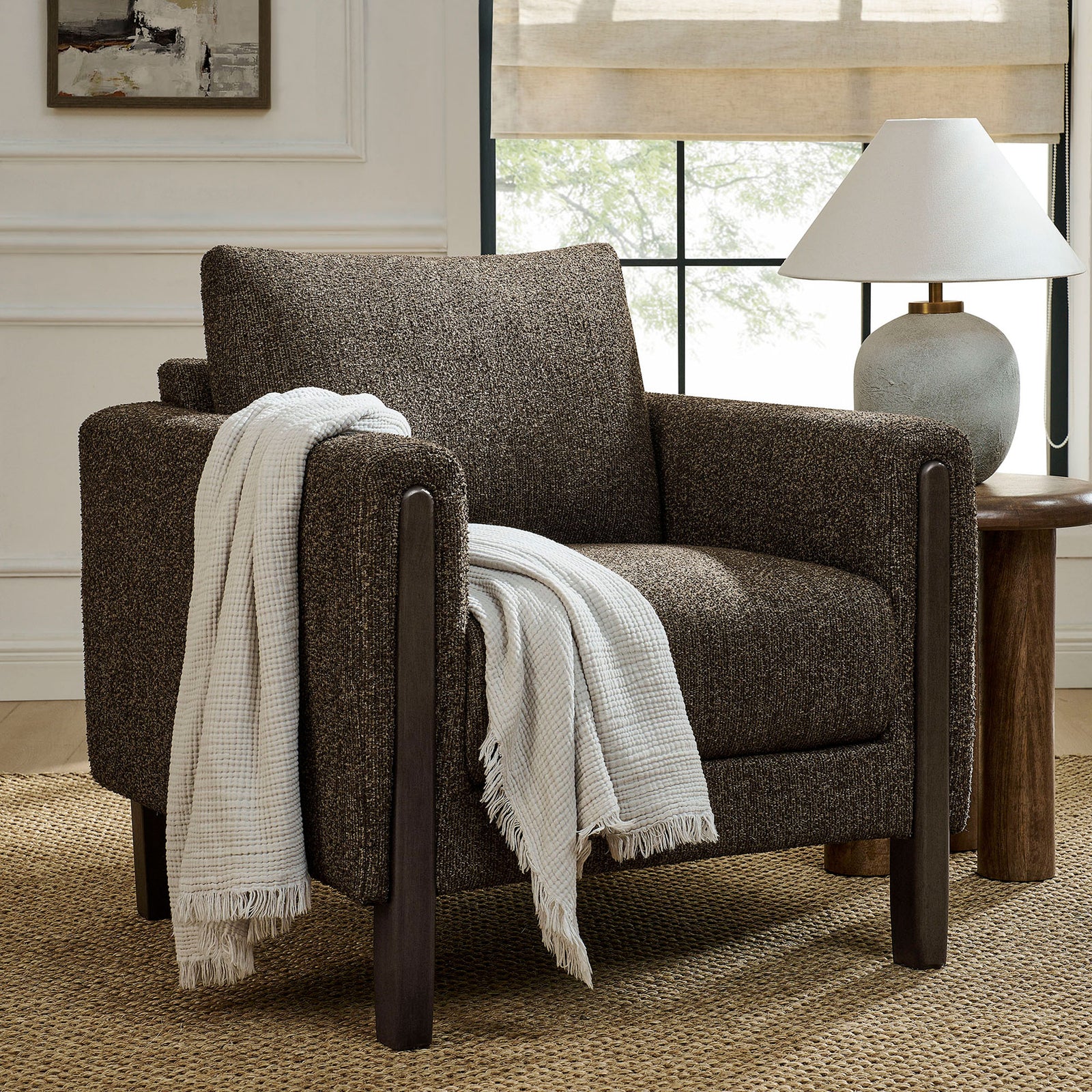 Lounge-ready accent chair adds rich texture and warm wood to elevate any living space. || EEI-7459-ATQ-ESP || front_angle_room