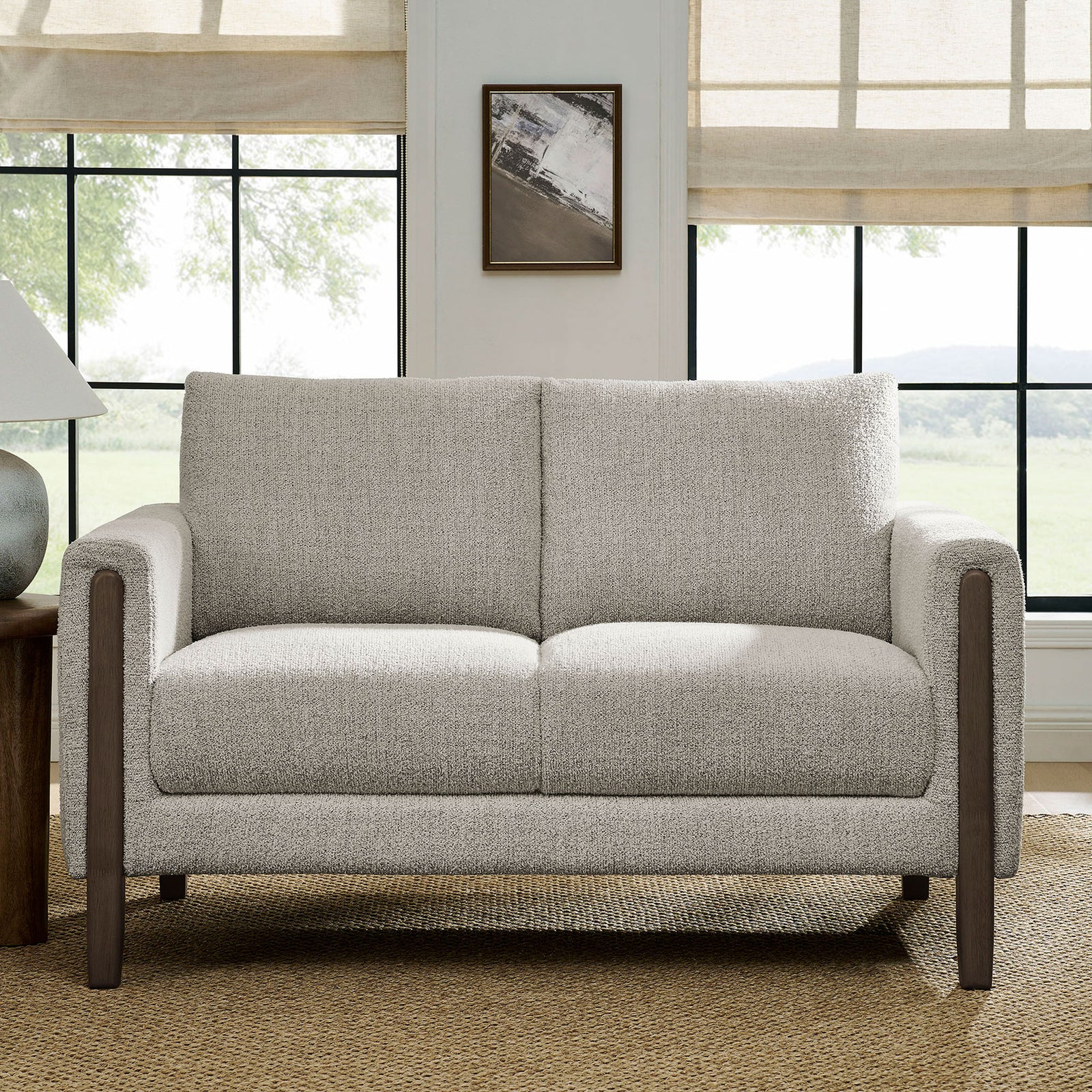 Parchment boucle loveseat styled with jute rug, wood side table, and bright windowed living room backdrop || EEI-7460-PCH-ESP || front_room