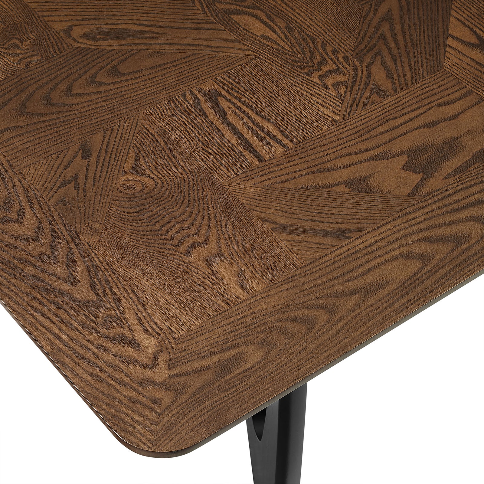 Walnut tabletop corner shows the intricate angled veneer pattern and smooth beveled edge detail. || EEI-7462-WAL || detail_studio