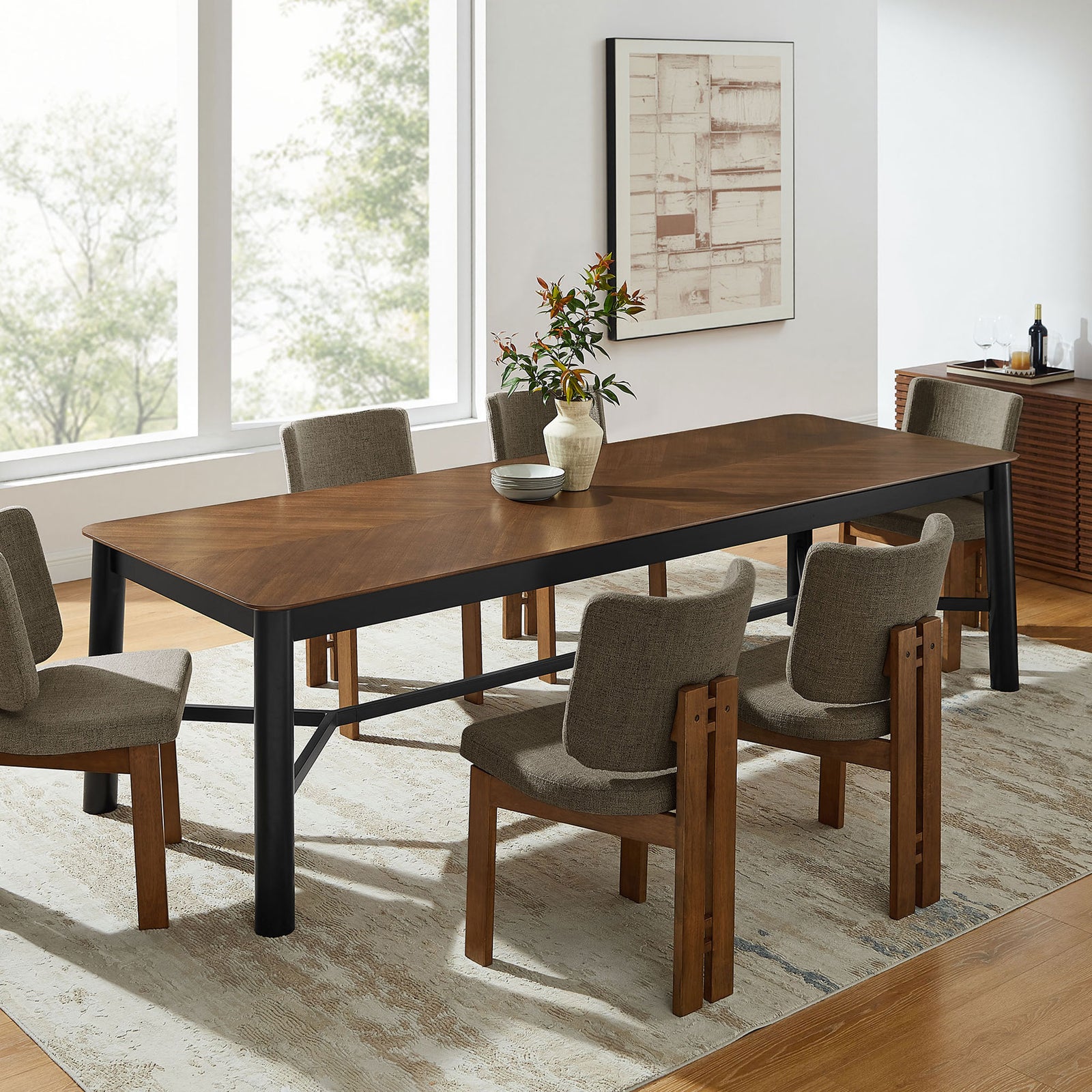 Walnut chevron dining table surrounded by upholstered chairs in a contemporary dining room || EEI-7463-WAL || front_angle_room