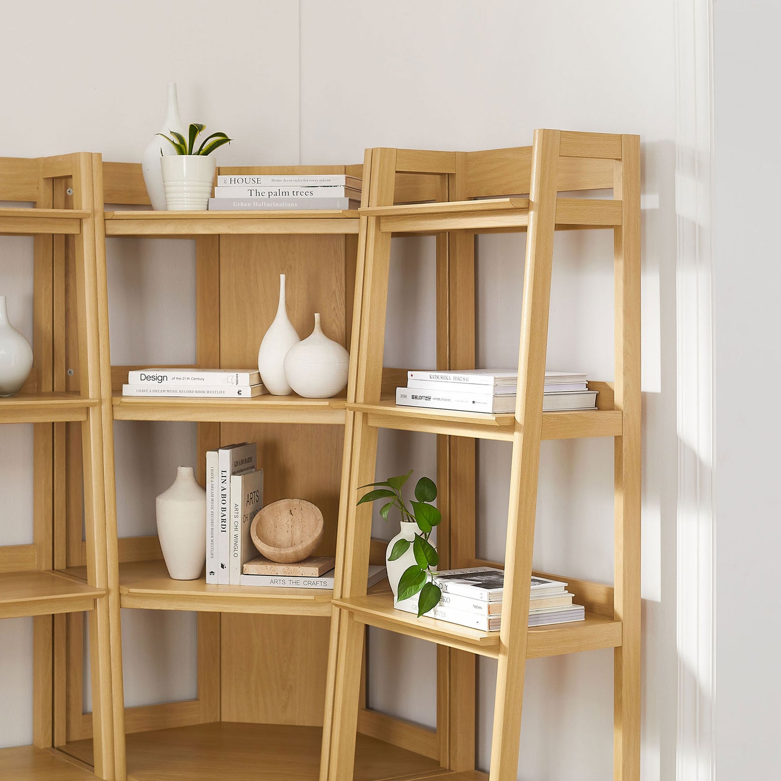 Styled shelves showcase decor and books, adding warmth and texture to your space. || EEI-7470-OAK || detail_room