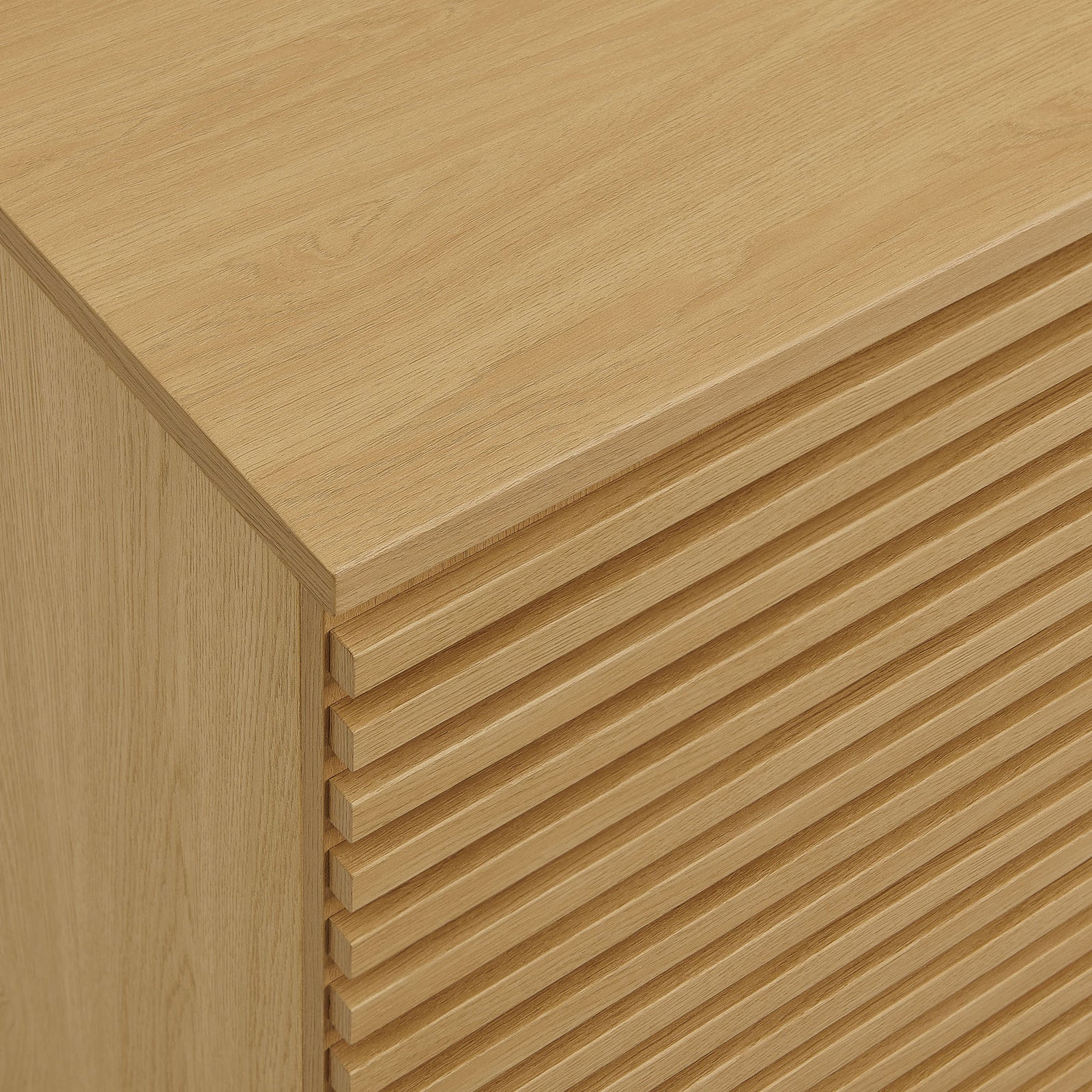 Detail of the oak wood grain and horizontal fluted slats on the Render accent cabinet doors || EEI-7476-OAK || swatch_studio