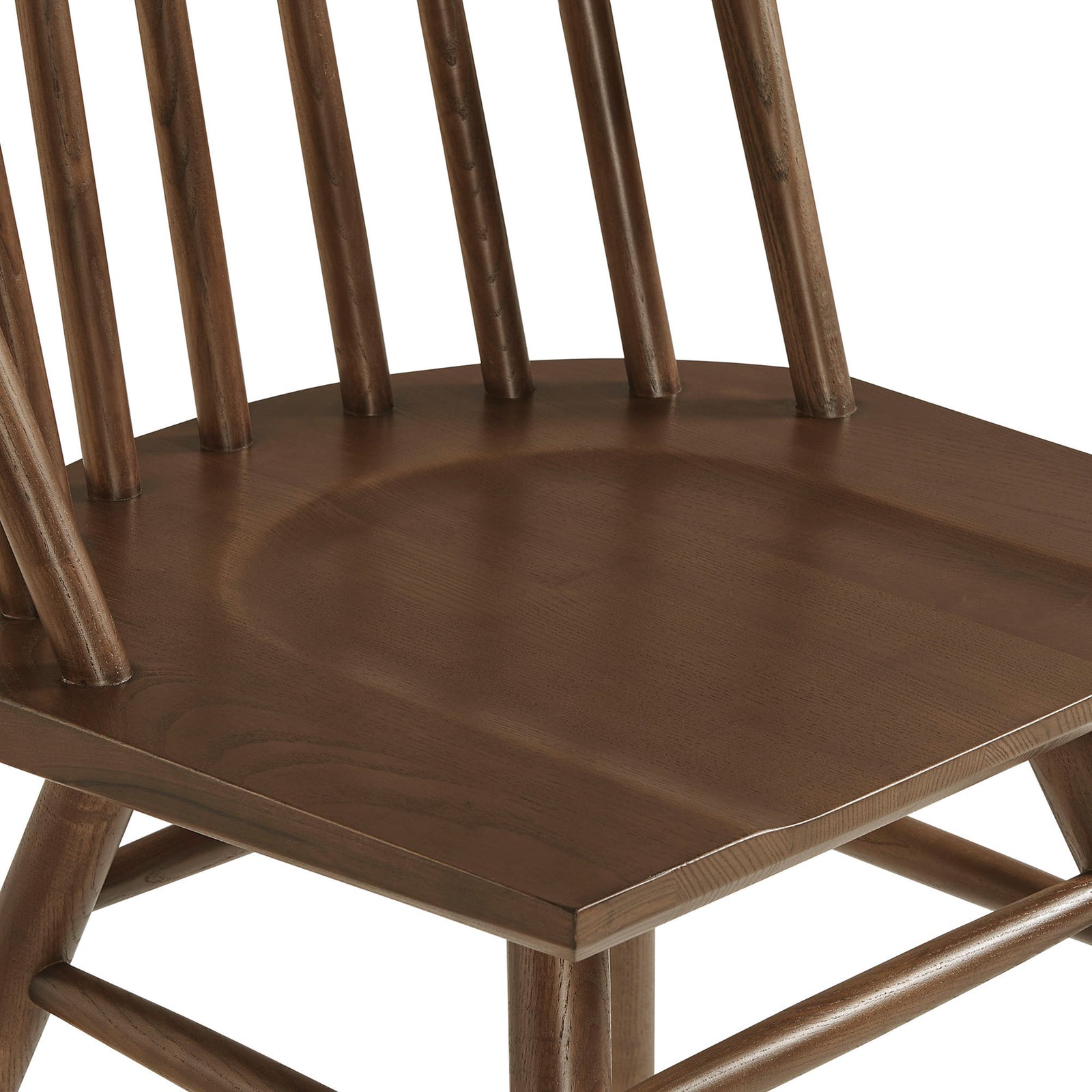 Close-up of walnut wood dining chair seat with smooth contouring and vertical spindle detail || EEI-7482-WAL || detail_studio