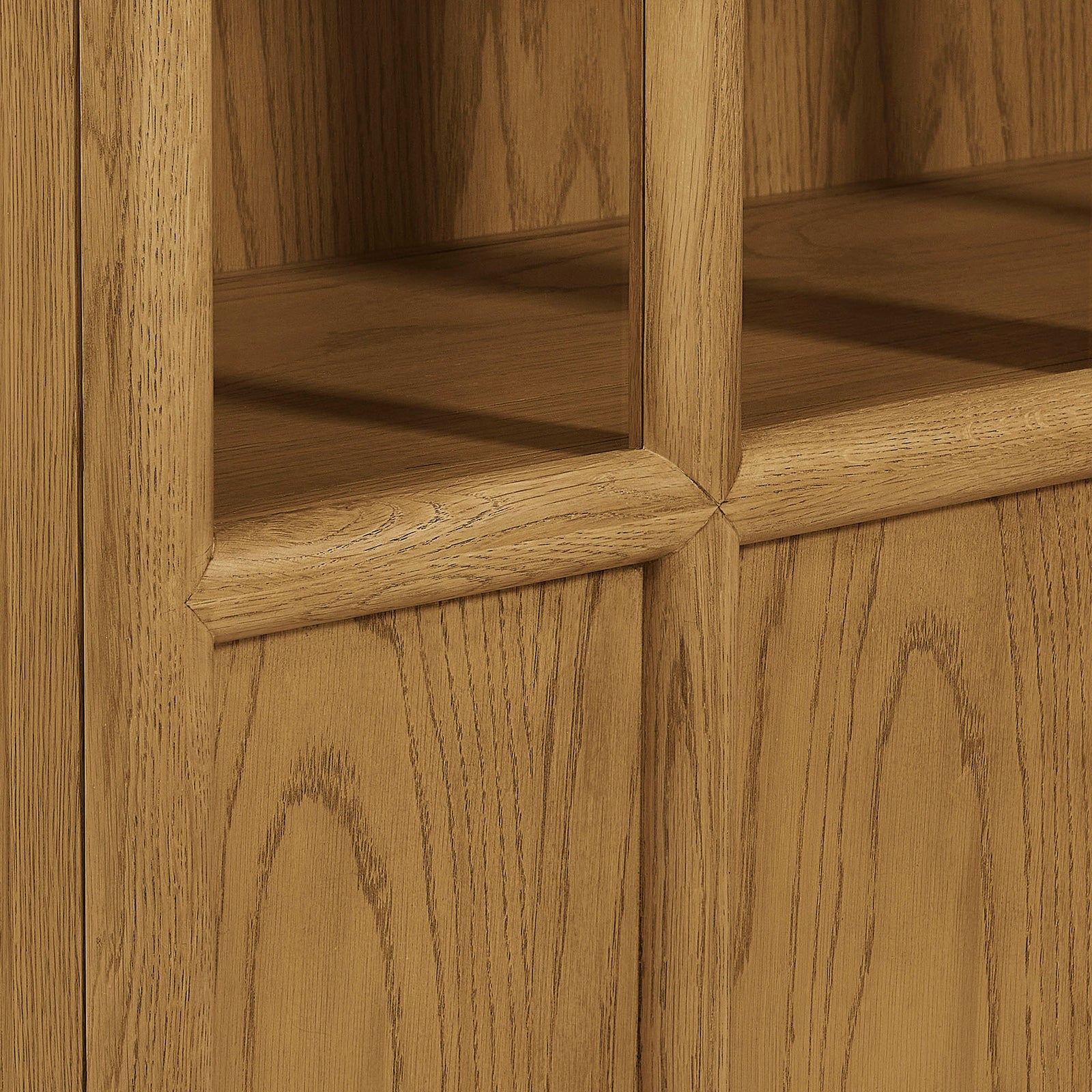 Crafted oak frame with sculpted mullions and pronounced grain for a warm, tailored cabinet style || EEI-7484-OAK || detail_studio
