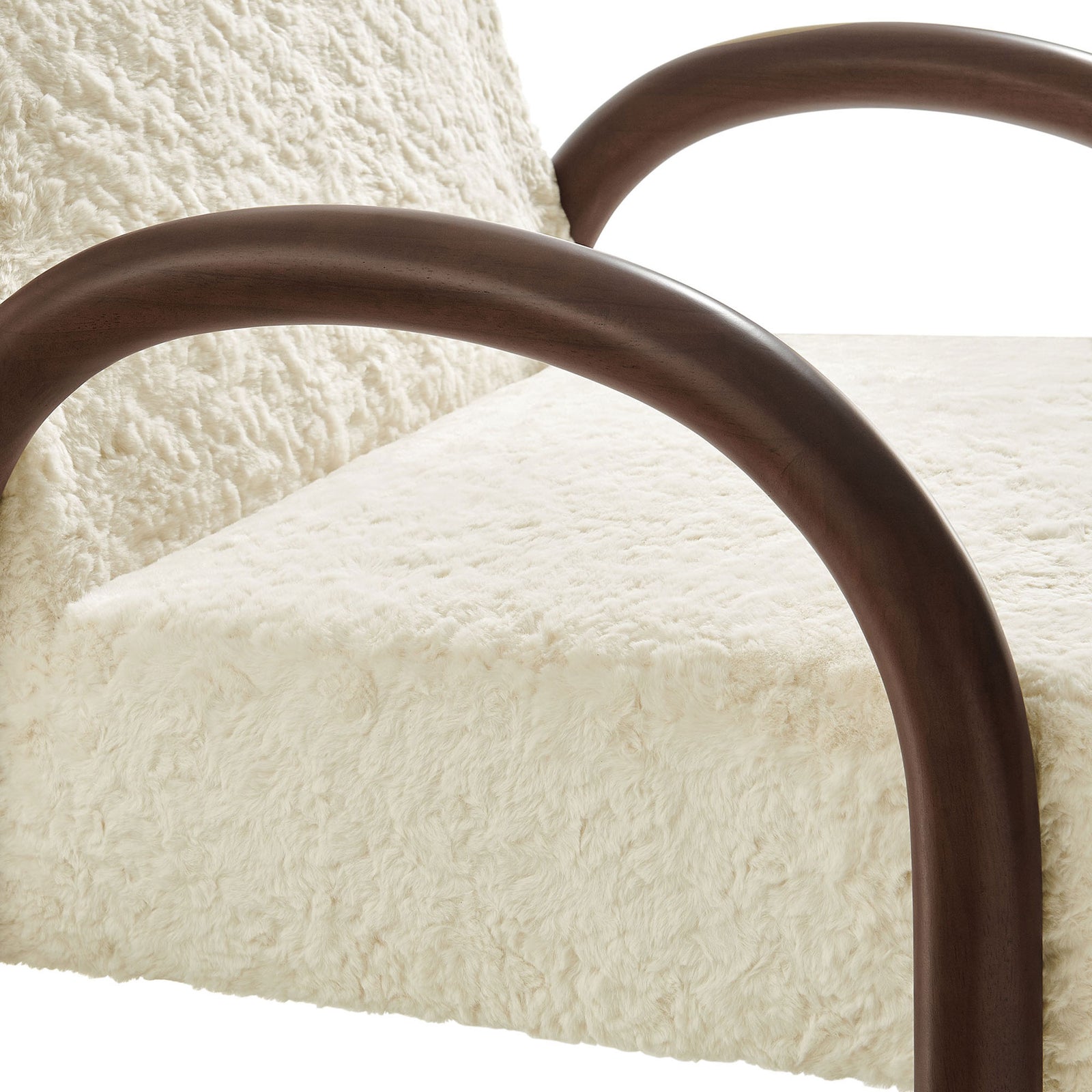 Soft faux shearling upholstery meets a smooth, rounded wood arm for tactile contrast || EEI-7488-ECR || detail_studio