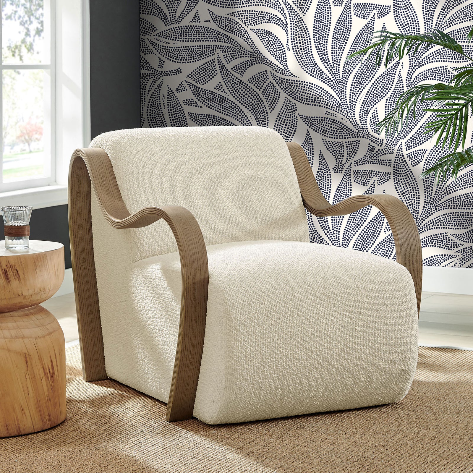 Modern chair elevates the room with creamy boucle and sculptural wood arms || EEI-7490-CRE || front_angle_room