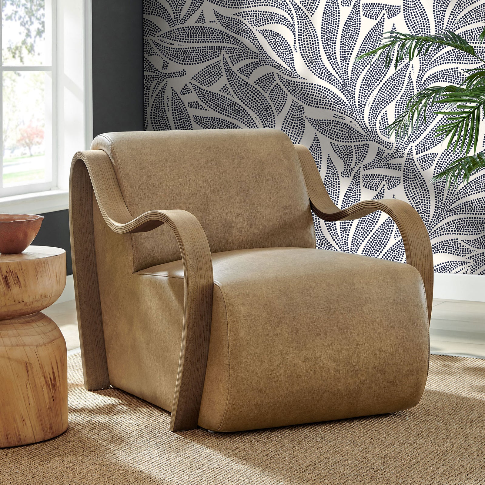 Warm toast tone and sculptural arms elevate modern living spaces with inviting lounge comfort || EEI-7491-TST || front_angle_room