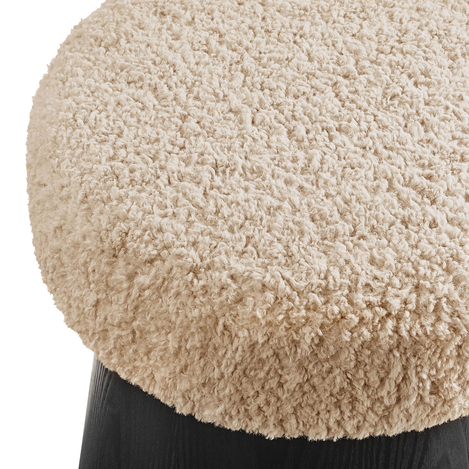 Soft looped faux shearling upholstery offers inviting texture on the rounded ottoman seat || EEI-7493-OAT-BLK || detail_studio