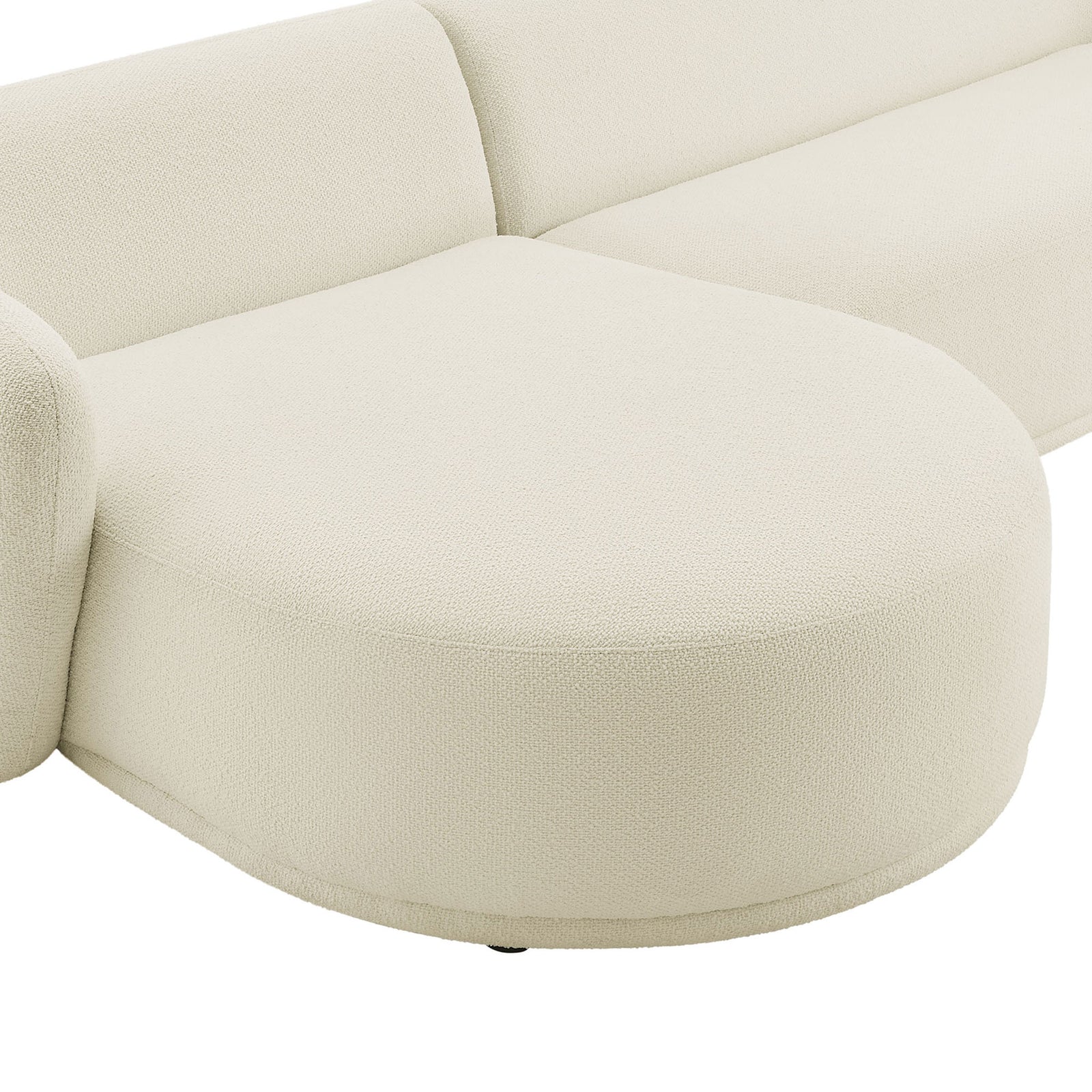 Cream boucle upholstery on the rounded chaise seat showcases a soft, textured finish. || EEI-7502-CRE || swatch_studio