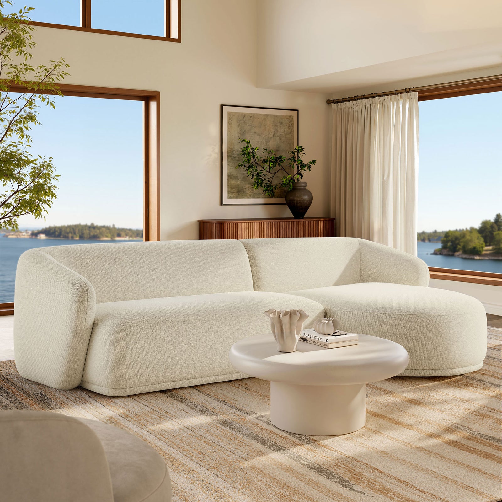 Right facing Monica sectional anchors an airy living room with large windows and a soft neutral palette. || EEI-7503-CRE || front_angle_room