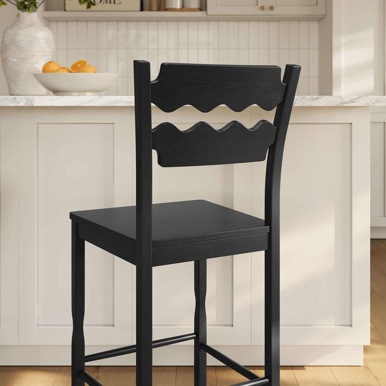 Sculptural wavy back detail complements bright, modern kitchen decor || EEI-7506-BLK || detail_room