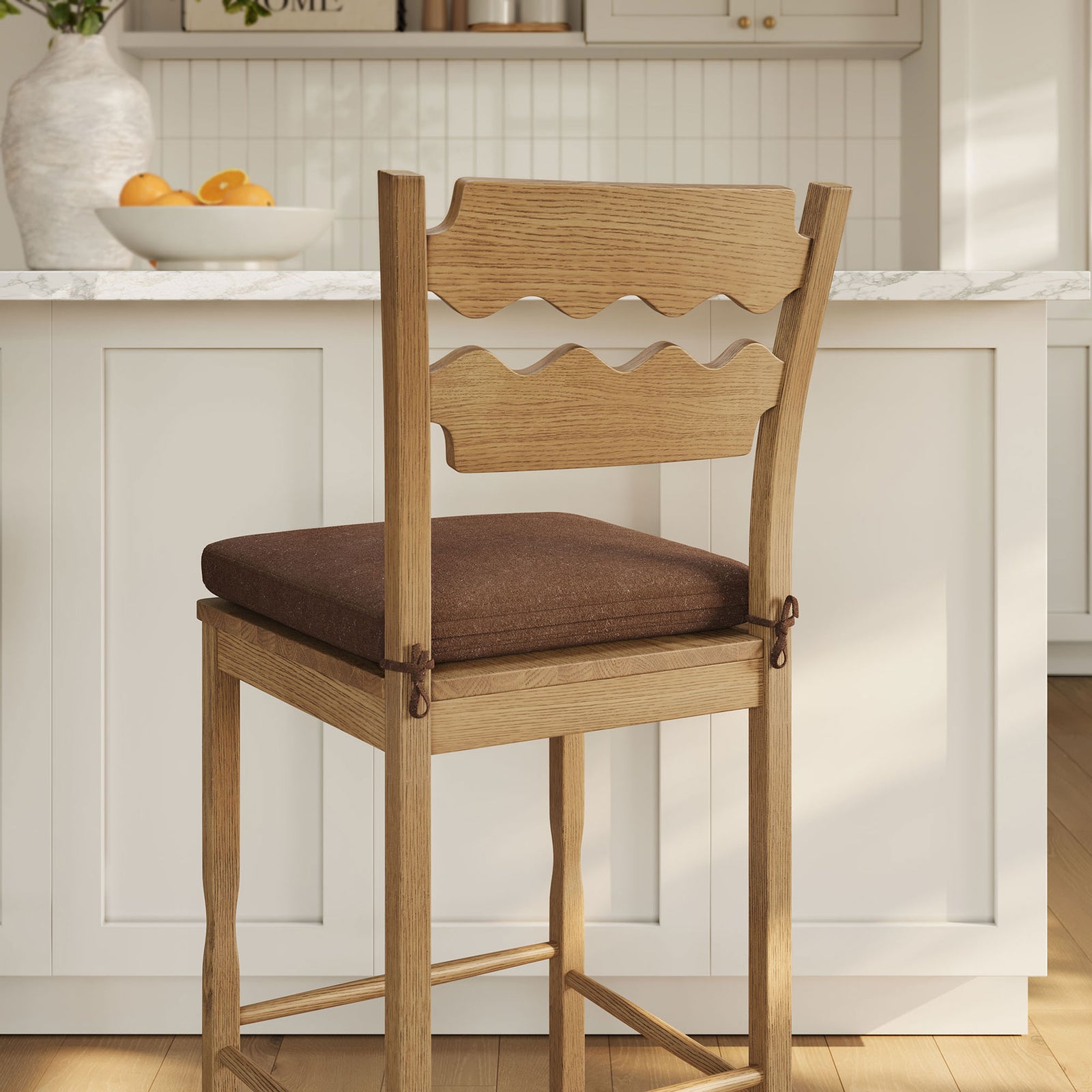 Backrest waves, cushion ties, and oak grain enrich the bar space with handcrafted detail || EEI-7519-WOA-COA || detail_room