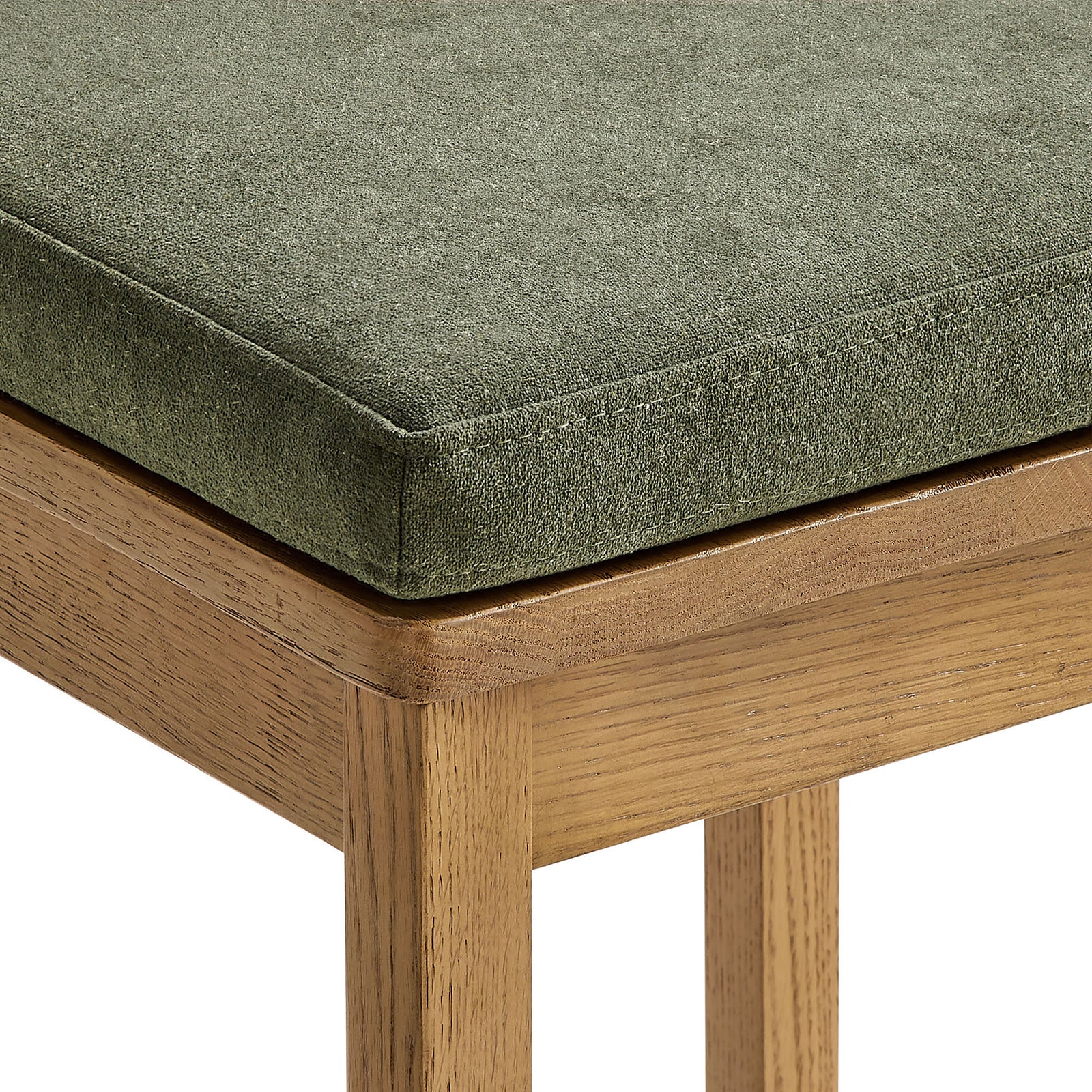 Plush sage cushion with tailored edges rests atop the oak frame || EEI-7519-WOA-SGE || detail_studio