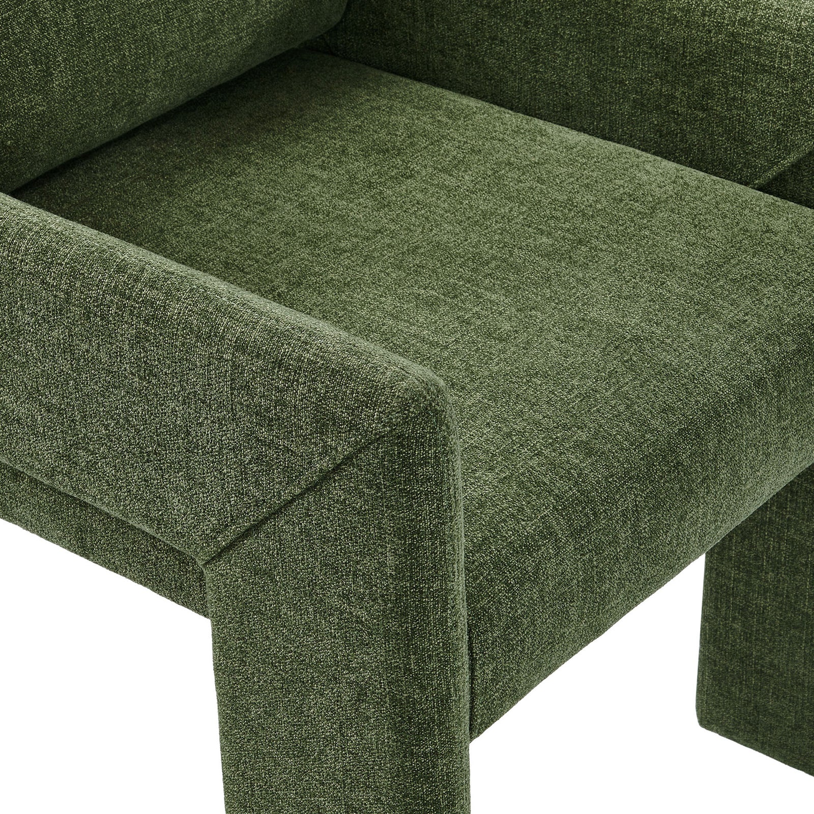 Seat and arm of the chair showing textured green fabric upholstery and tailored seams. || EEI-7524-FOL || detail_studio