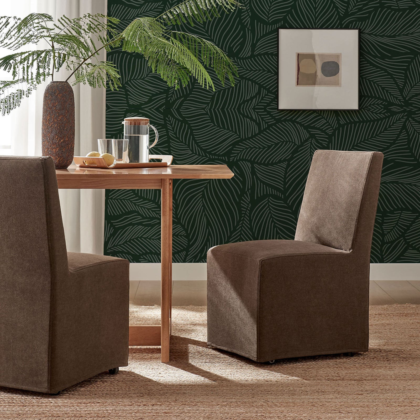 Cocoa slipcovered dining chair styled in a cozy dining nook with natural wood table and woven rug || EEI-7528-COA || front_angle_room