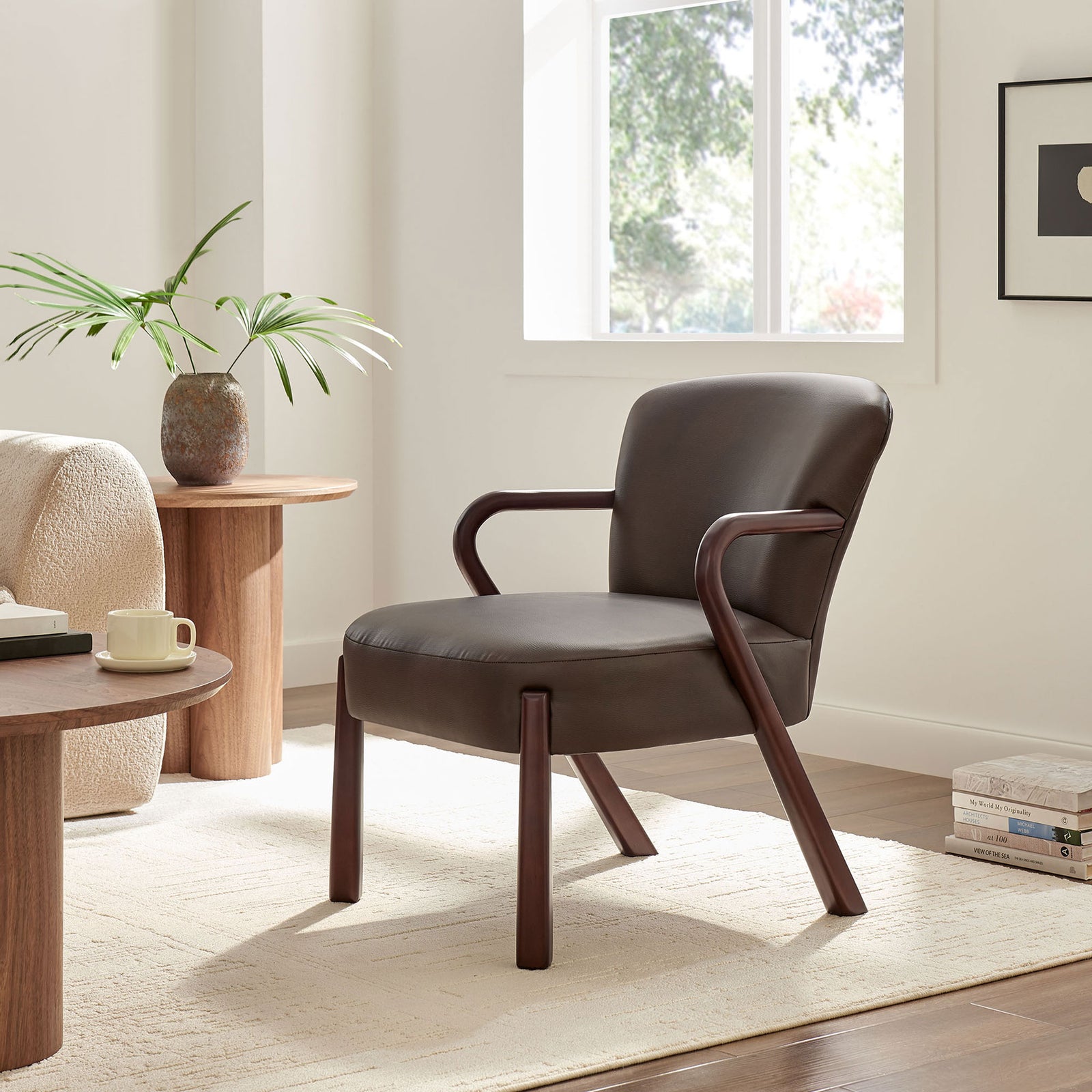 Modern lounge chair pairs espresso faux leather with curved wood arms for inviting, everyday style || EEI-7529-ESP || front_angle_room