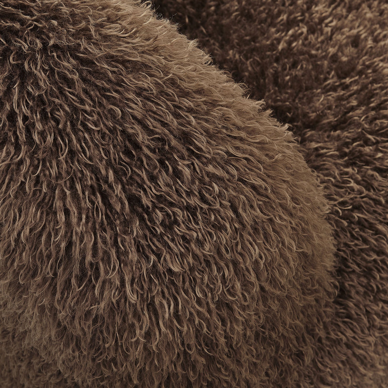 Soft, shaggy faux fur upholstery with rich texture and inviting depth || EEI-7534-BRN || detail_studio