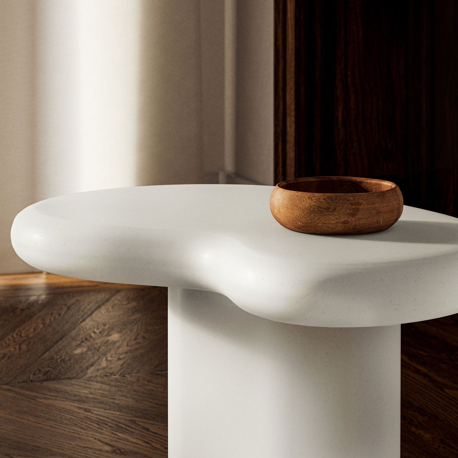 White concrete tabletop in a moody interior, paired with a wooden bowl for a soft modern contrast || EEI-7535-WHI || detail_room