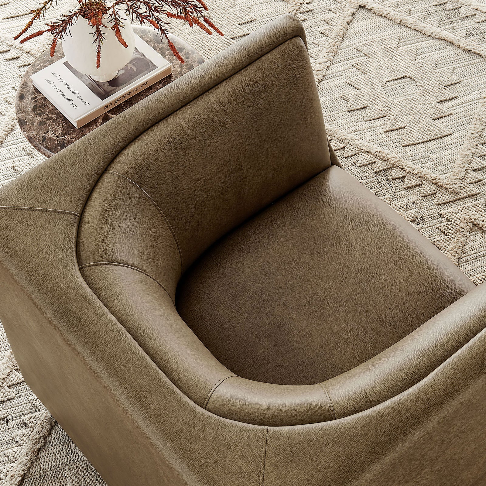 Textured vegan leather and contoured cushioning bring soft, modern comfort to your living space. || EEI-7569-MUS || detail_room