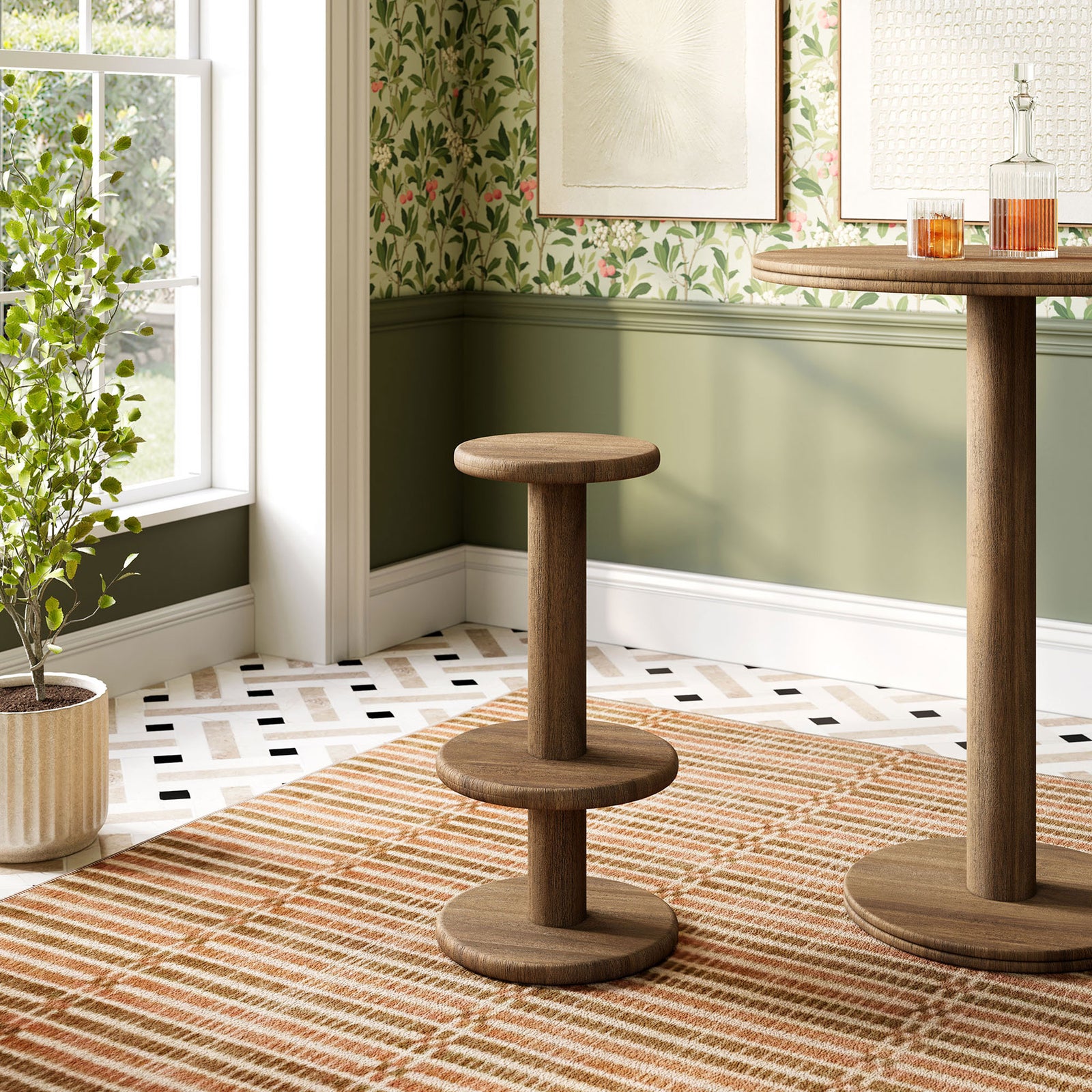 Cocoa brown acacia bar stool beside a matching pedestal bar table in a bright dining nook || EEI-7586-COA || front_angle_room