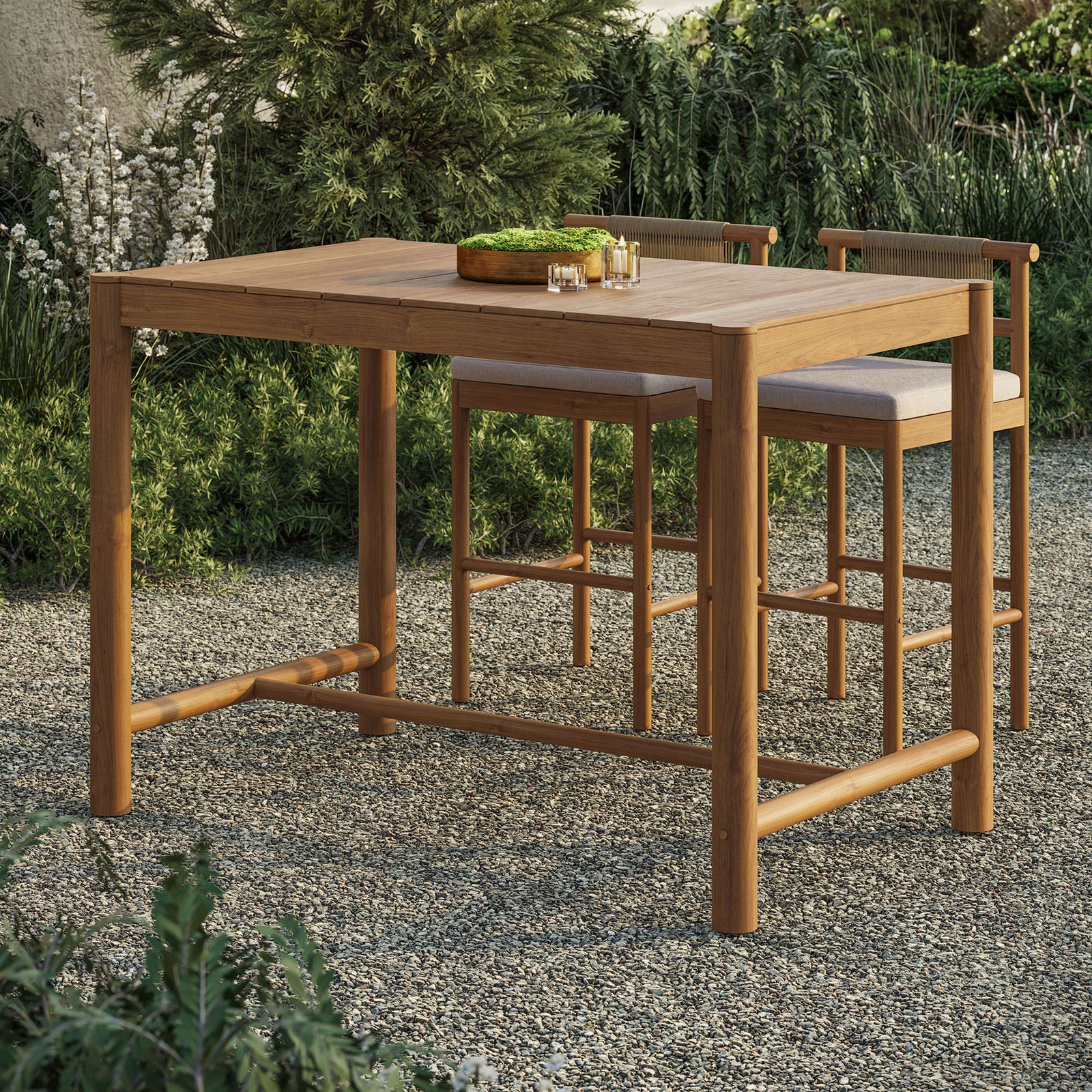 Natural teak bar table creates an inviting outdoor dining spot when paired with coordinating stools || EEI-7629-NAT || front_angle_room