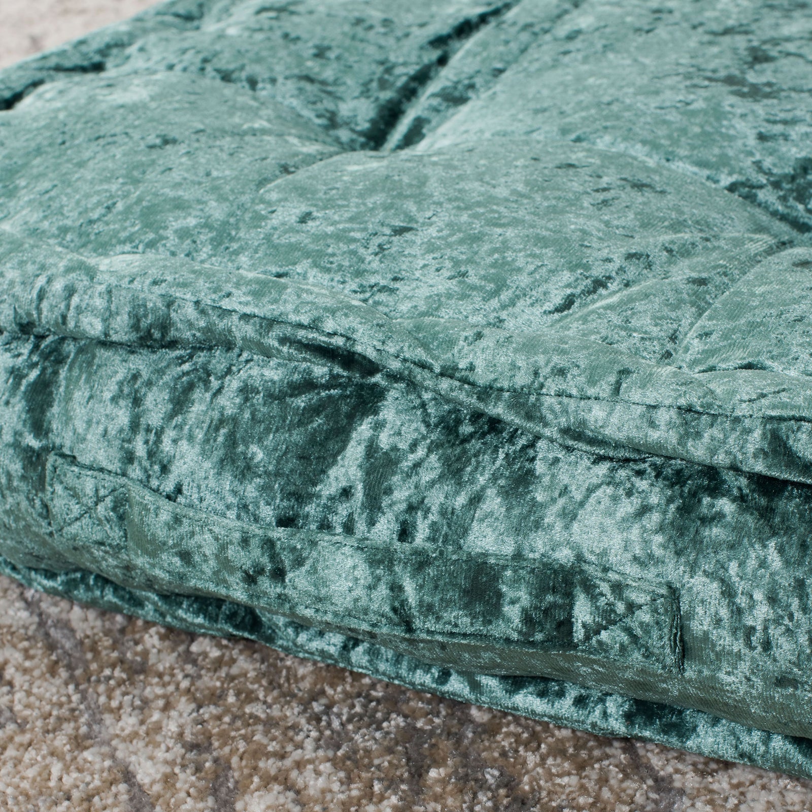 Soft green tufting flows into a neatly piped edge and thick, plush side. || FLP1001J-1818 || detail_room
