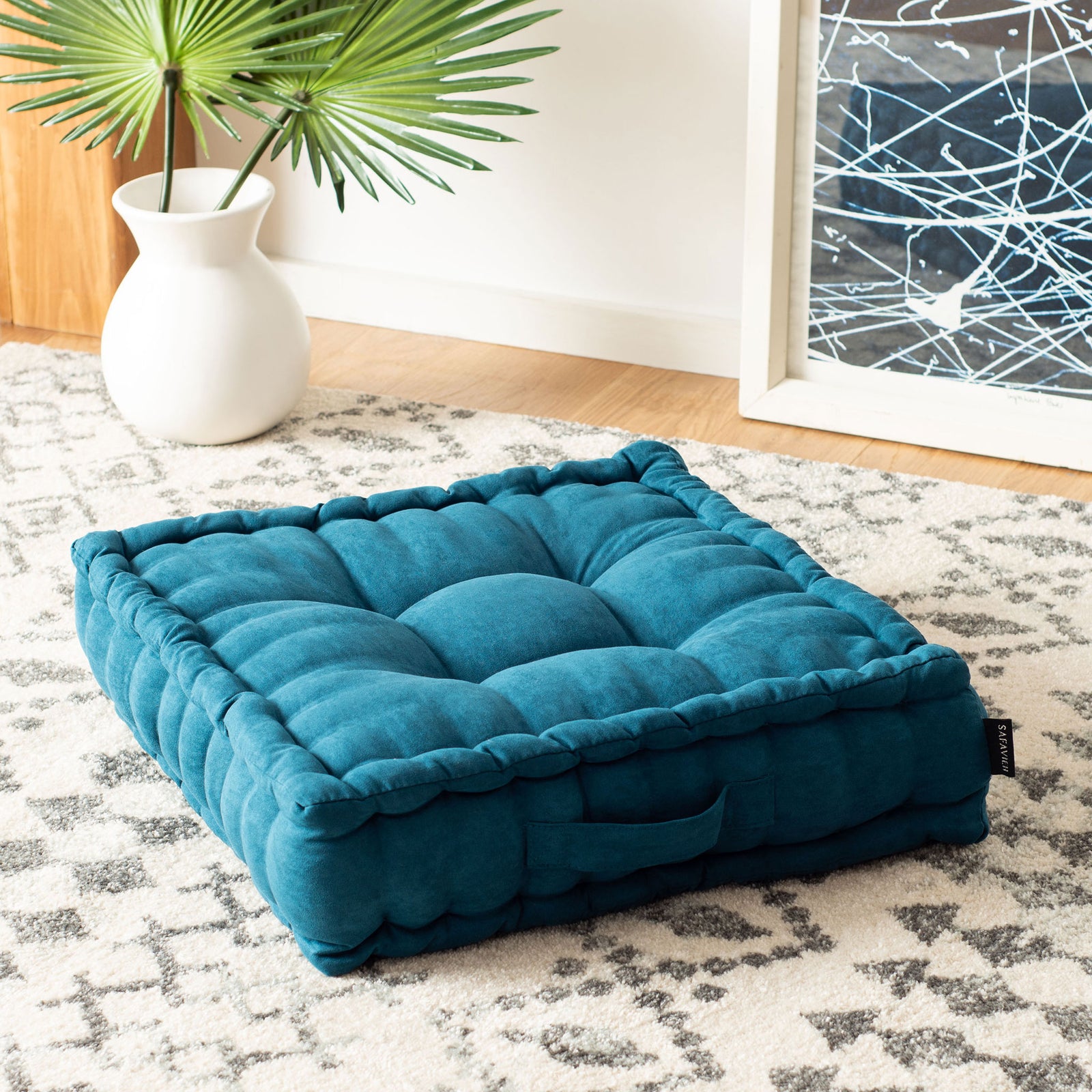 Rich turquoise floor pillow with pillowy tufted padding and a generously cushioned side || FLP1002B || front_angle_room