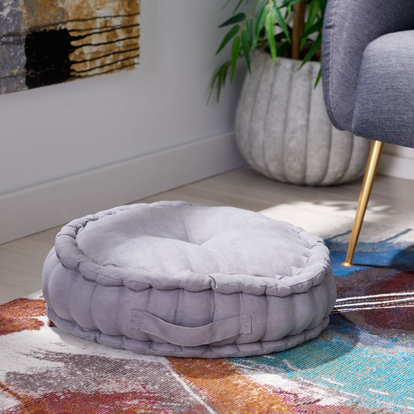 Plush gray floor pillow adds casual seating with a tufted top, channeled sides, and a carry handle || FLP1014D || front_angle_room